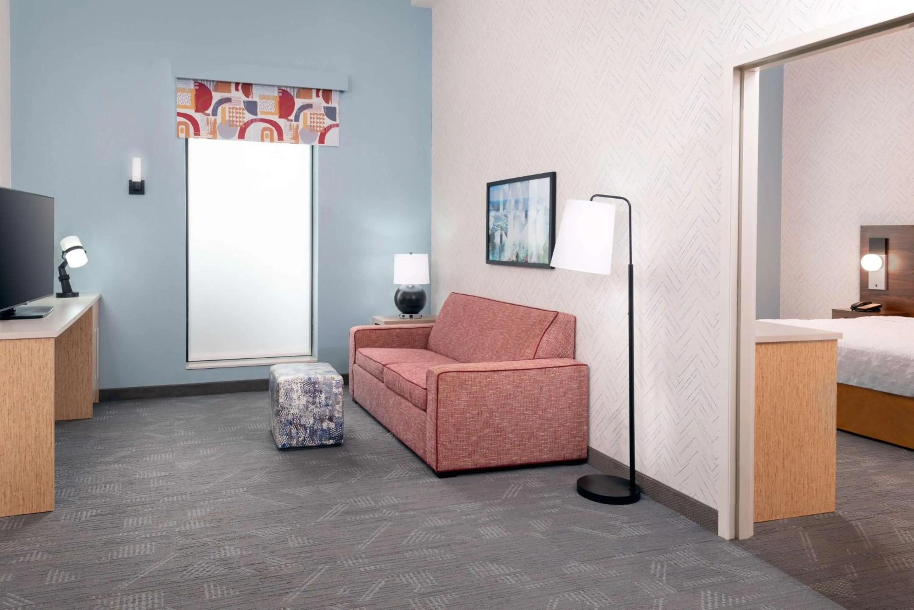 Living room, Bed in Home2 Suites by Hilton Buffalo Airport/ Galleria Mall