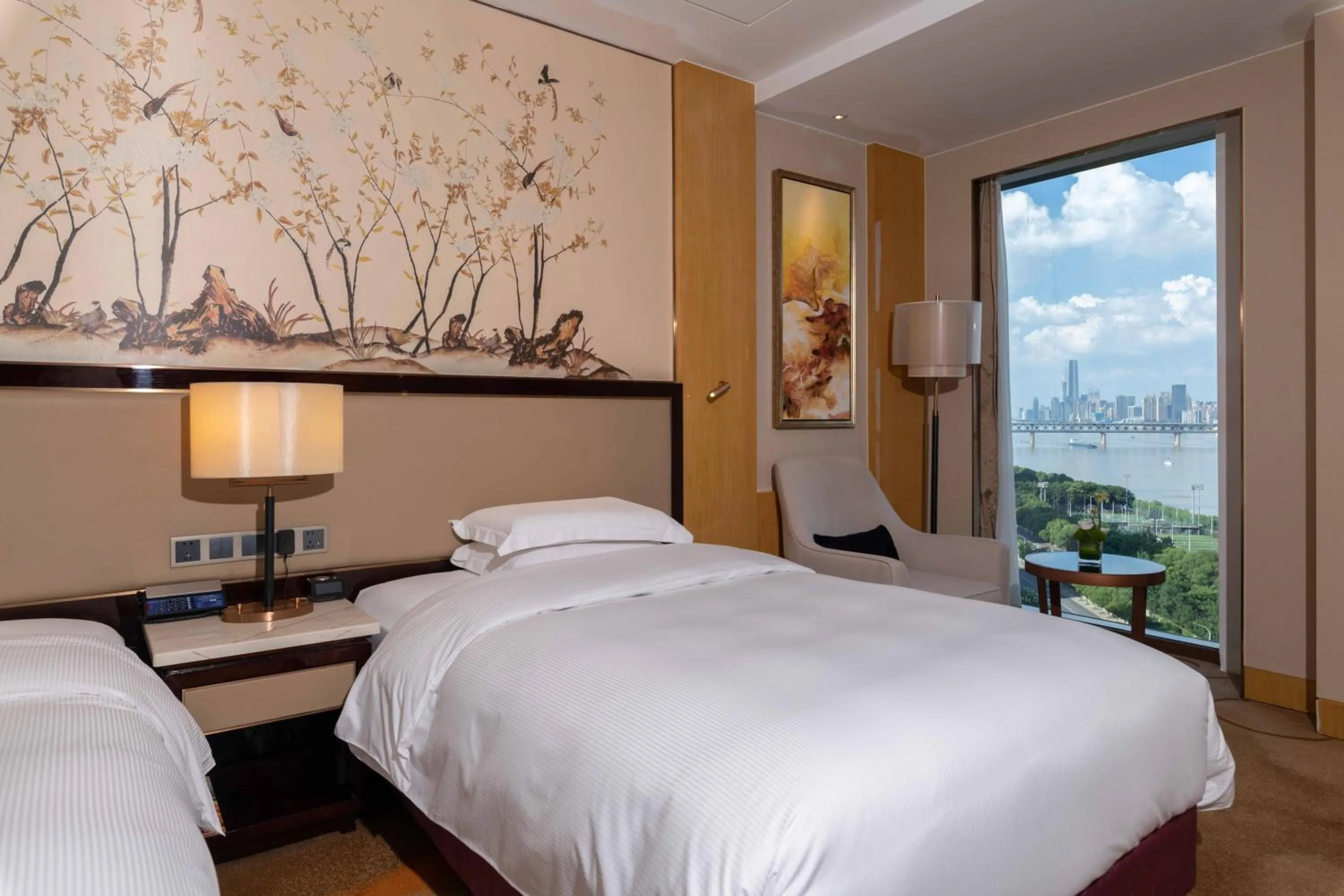 Photo of the whole room, Bed in Hilton Wuhan Yangtze Riverside