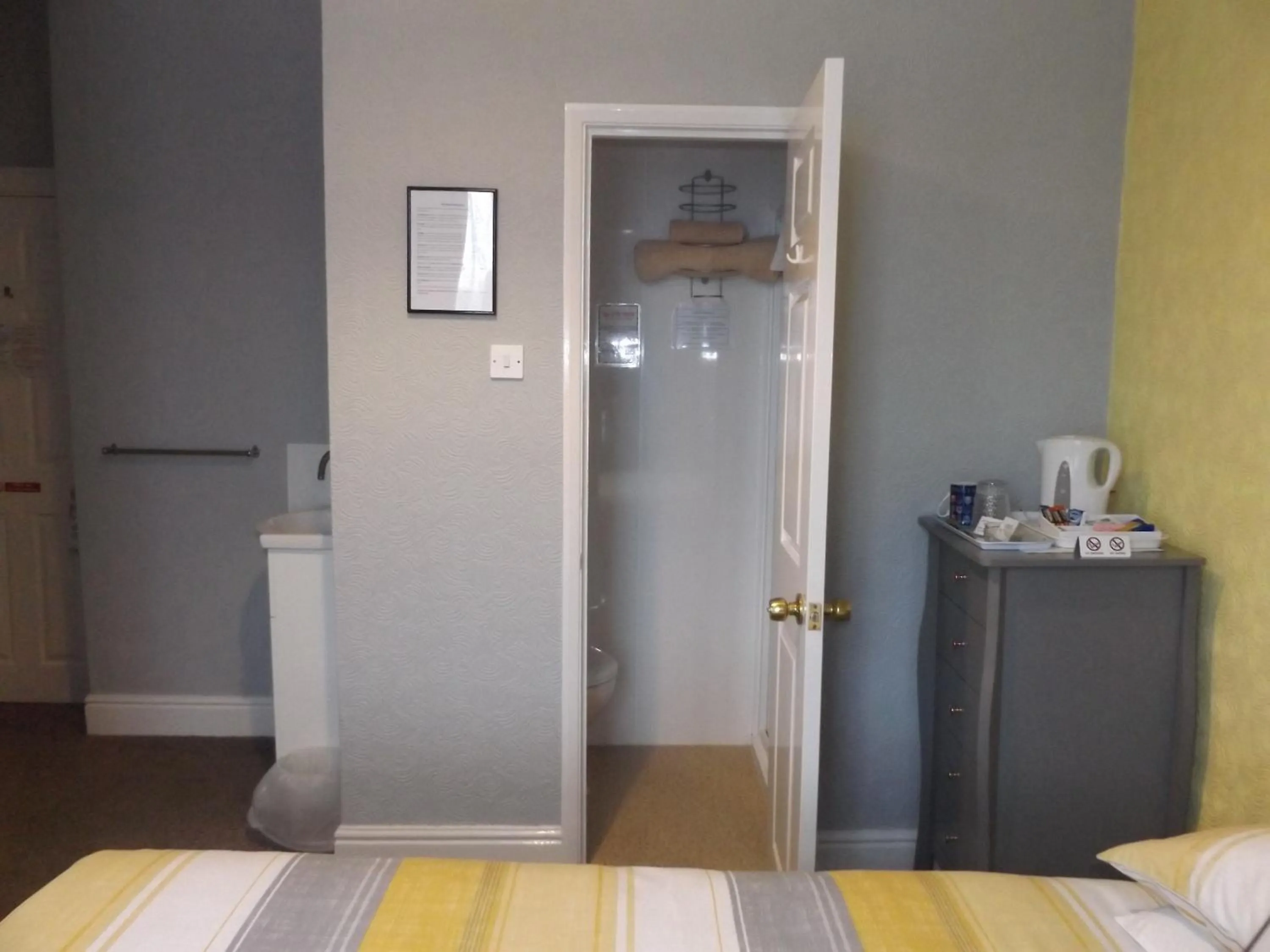 Shower, Bed in The Phoenix Guest House