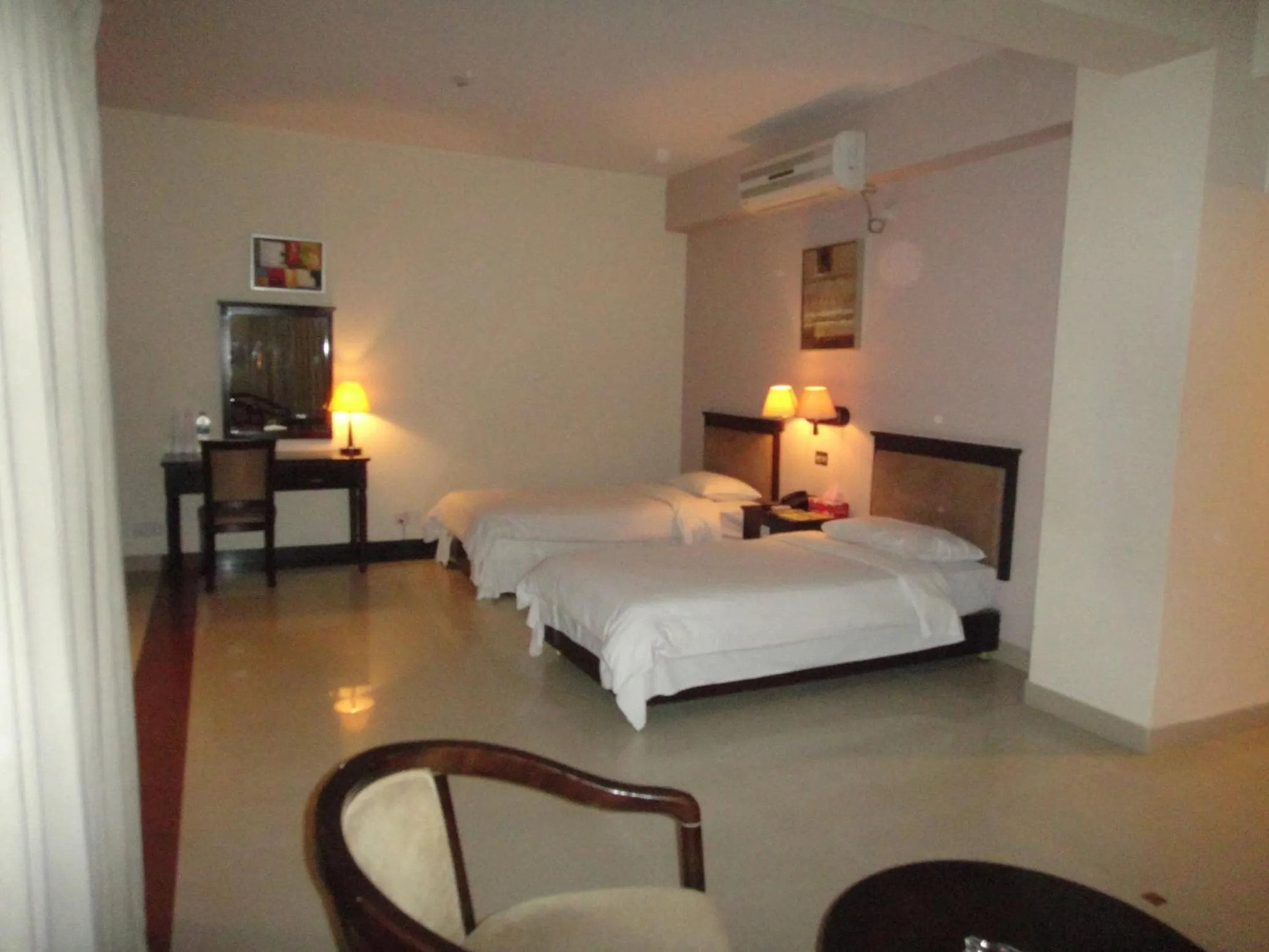 Photo of the whole room, Bed in Nirvana Inn