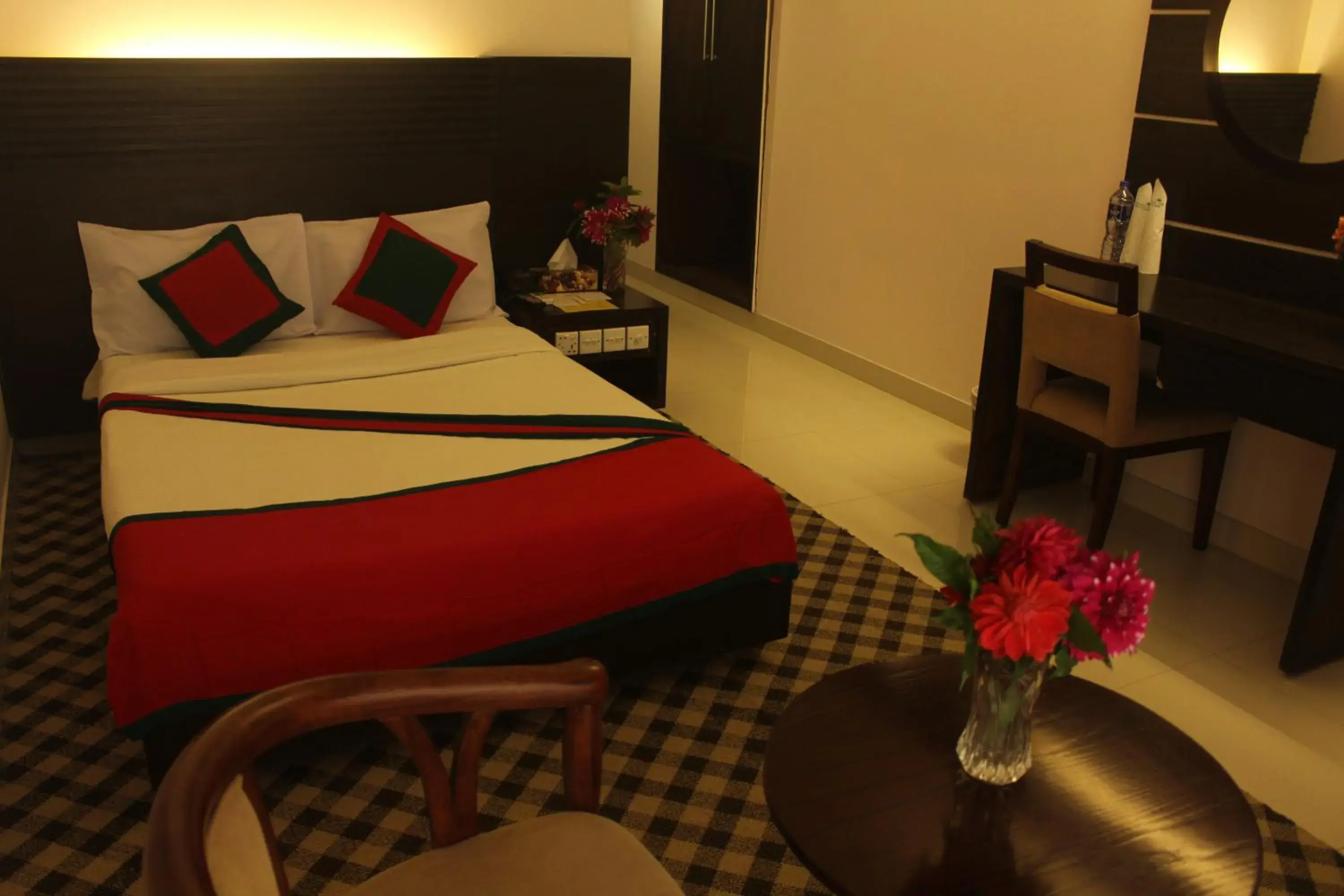 Deluxe Double Room (2 Adults + 1 Child) in Nirvana Inn Deluxe Double Room (2 Adults + 1 Child) in Nirvana Inn