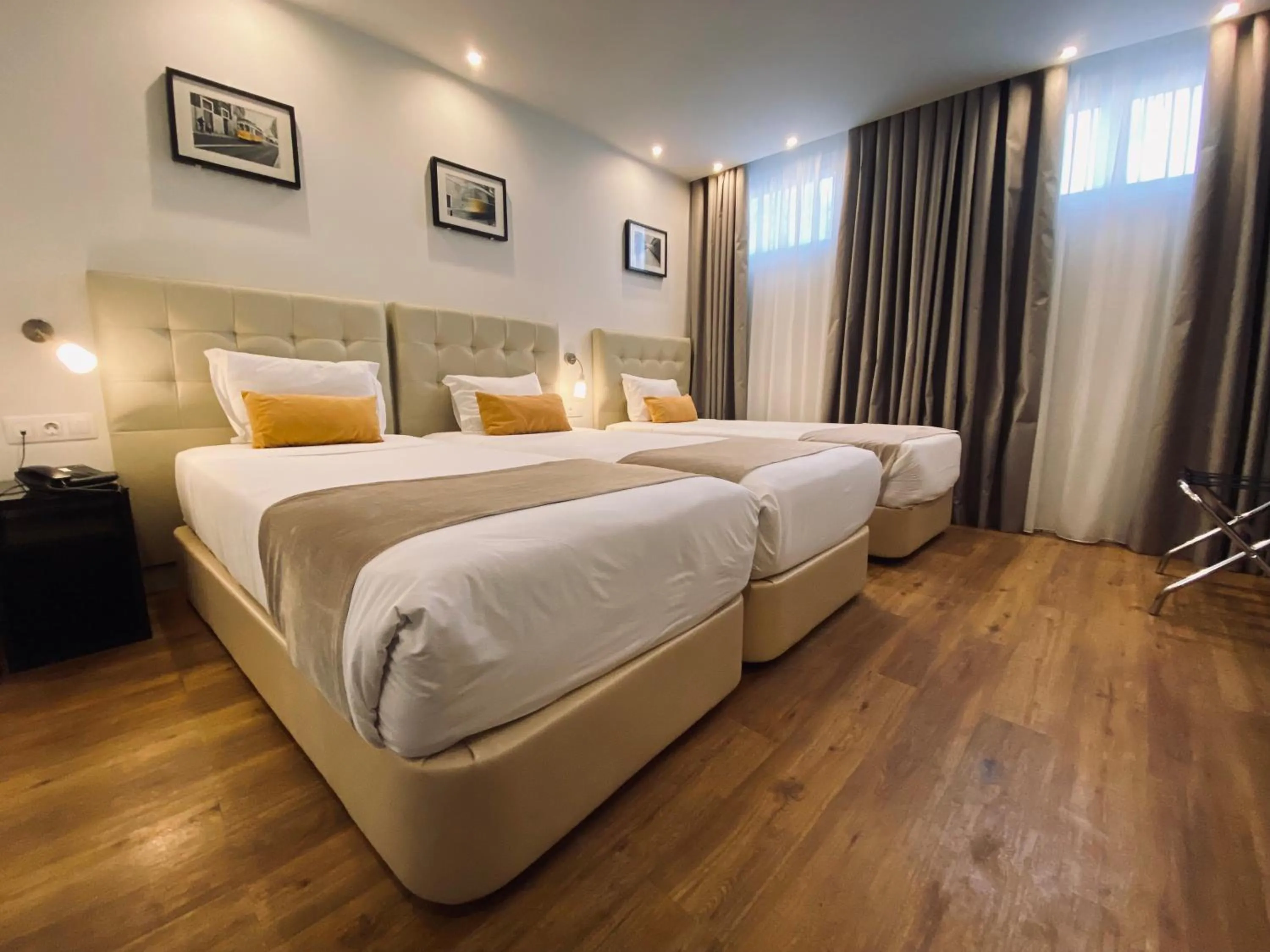 Bed in Lisbon City Apartments & Suites by City Hotels