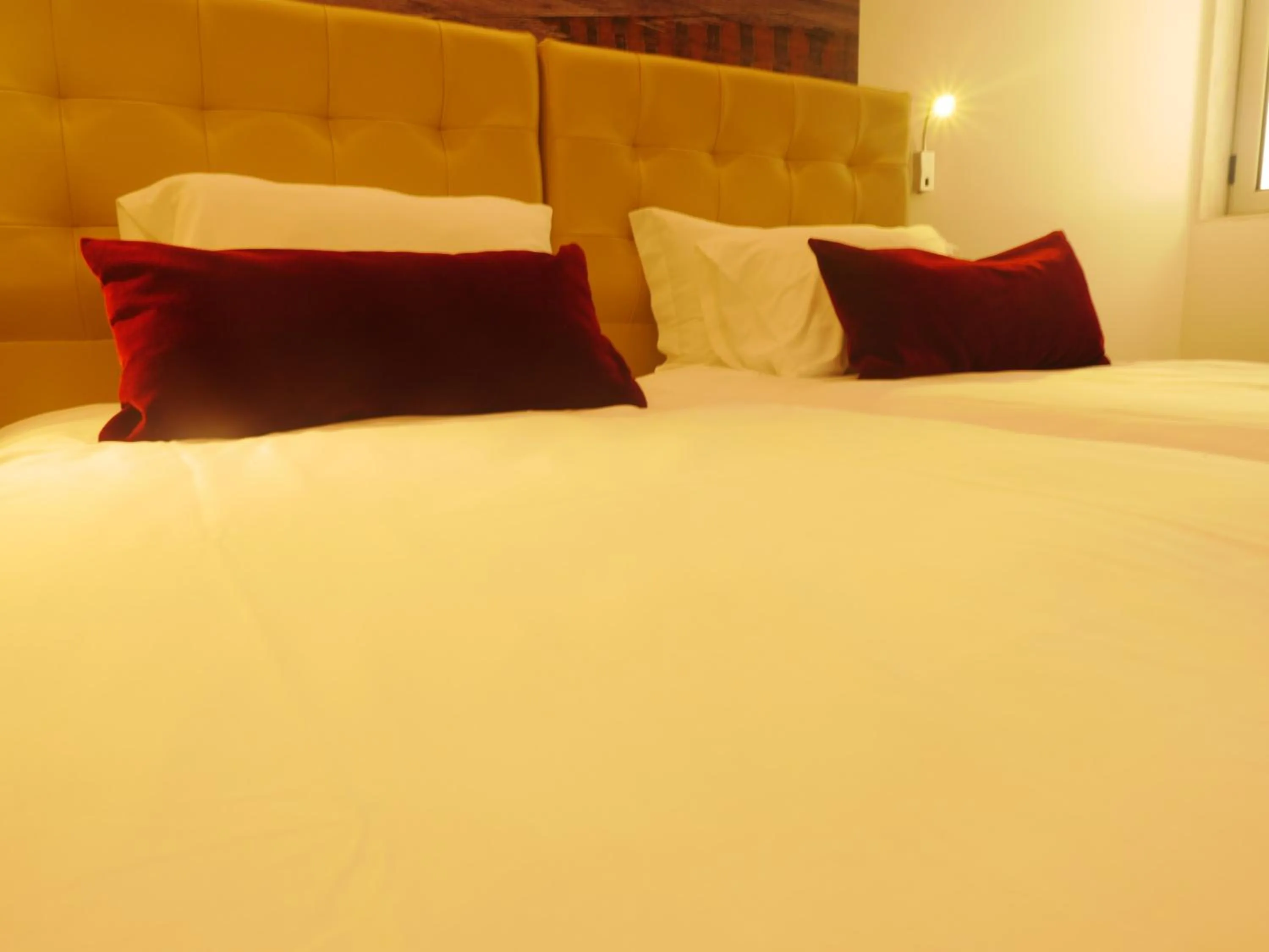 Bed in Lisbon City Apartments & Suites by City Hotels