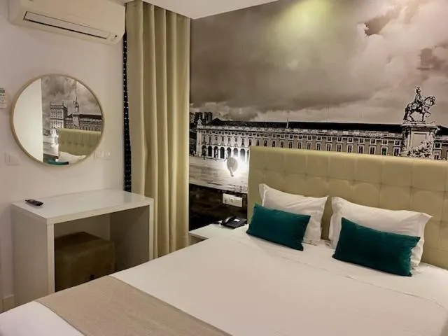 Bed in Lisbon City Apartments & Suites by City Hotels