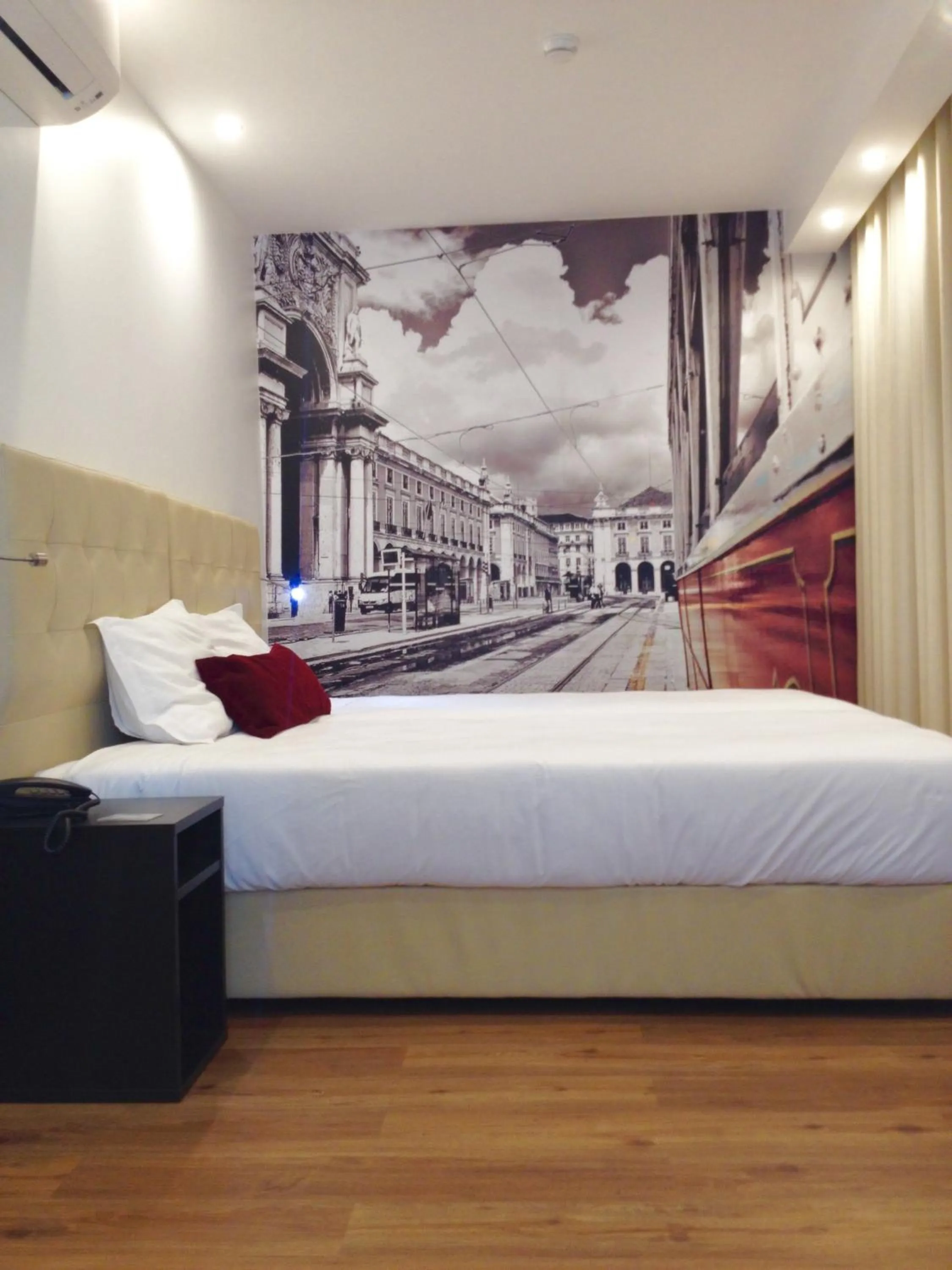 Bed in Lisbon City Apartments & Suites by City Hotels