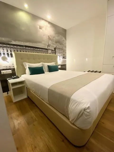 Bed in Lisbon City Apartments & Suites by City Hotels