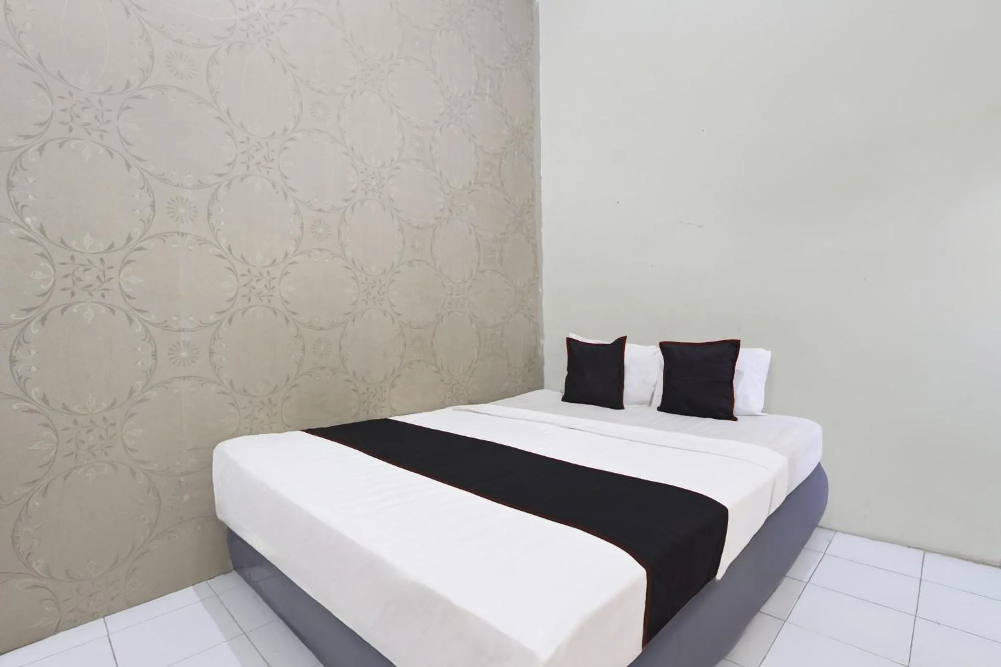 Bedroom, Bed in Hotel O Near Tugu Yogyakarta 2 formerly Monjali Inn