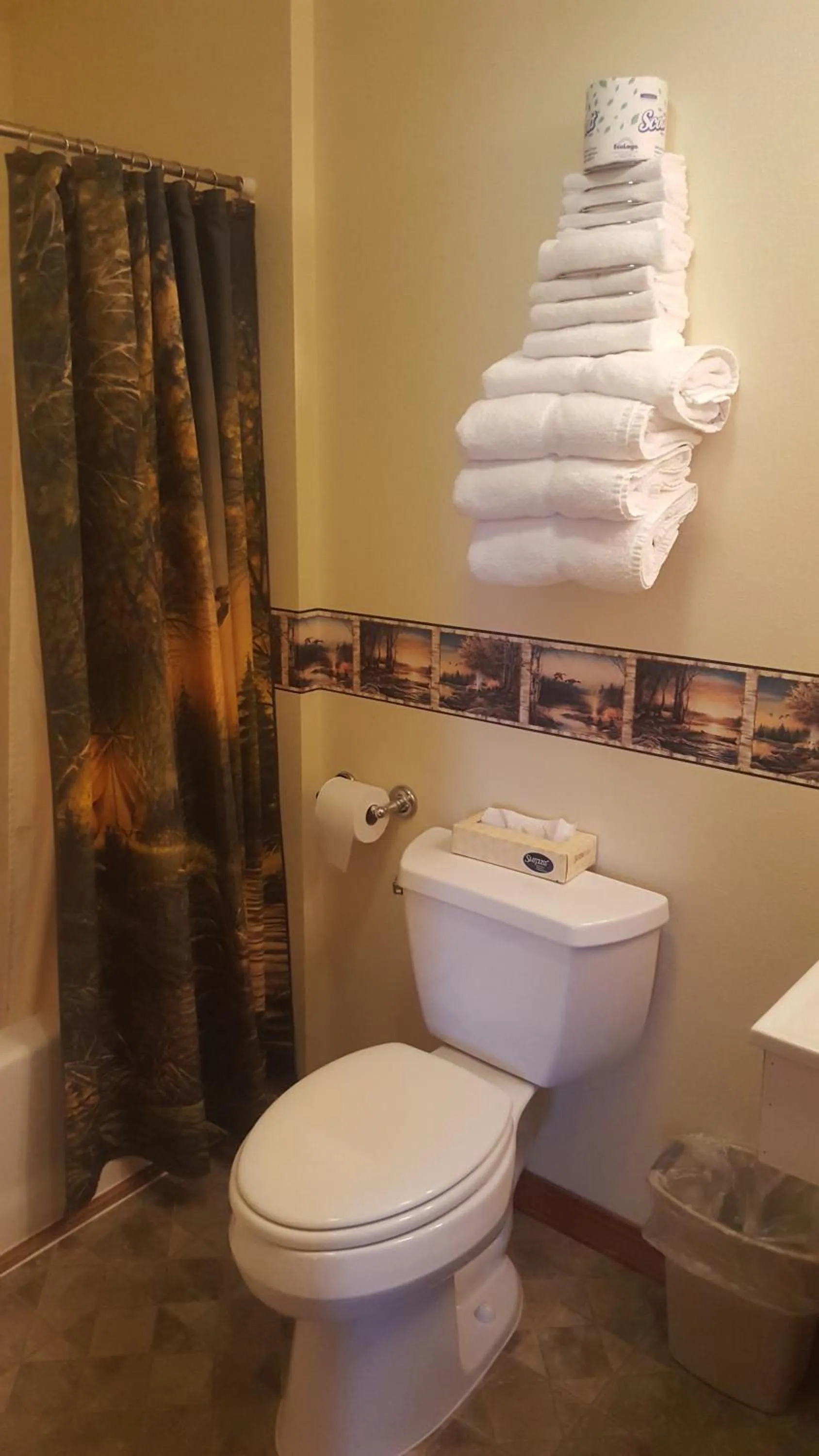 Toilet in Longliner Lodge and Suites