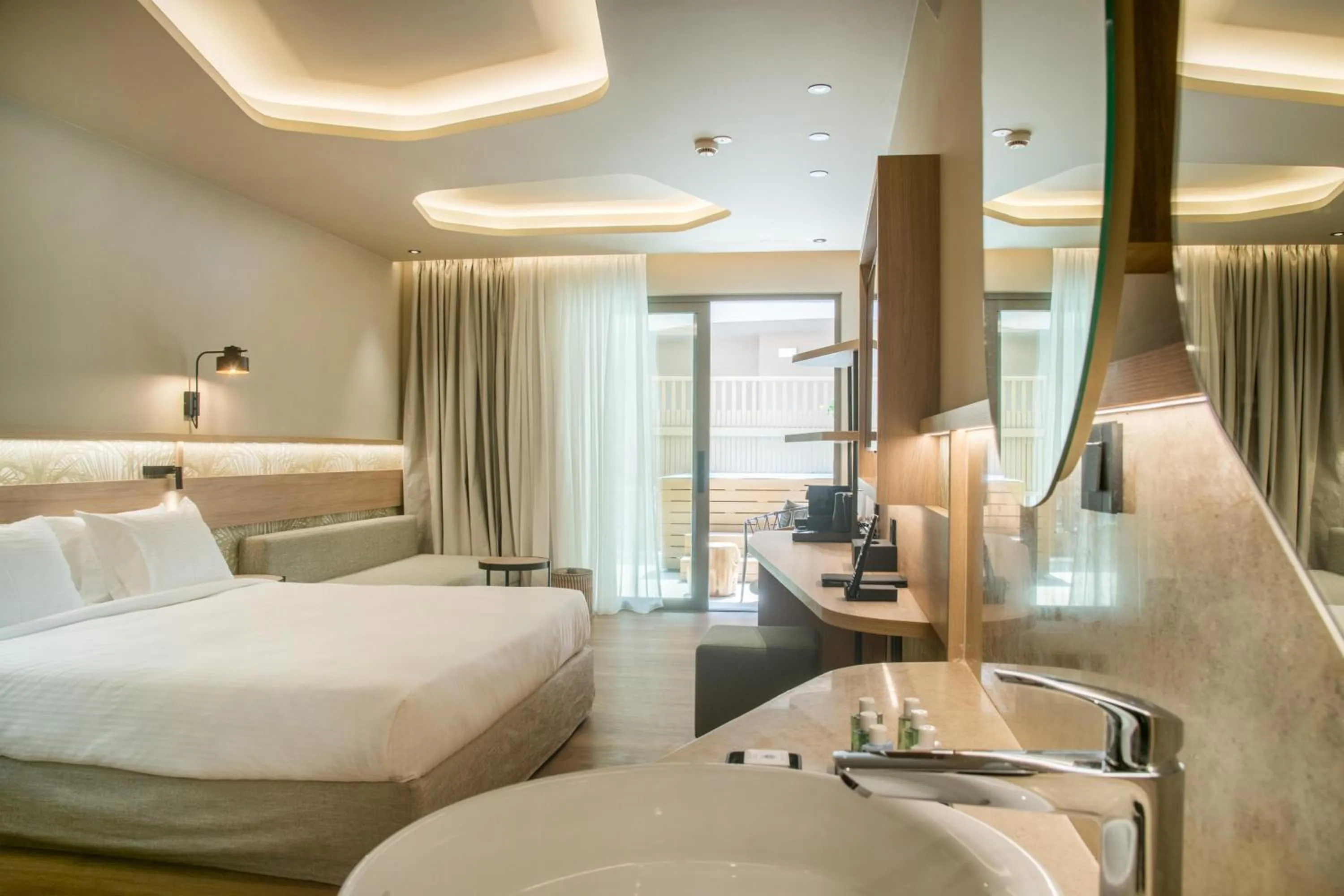 Photo of the whole room, Bed in SENSEANA Sea Side Resort & Aquadventure