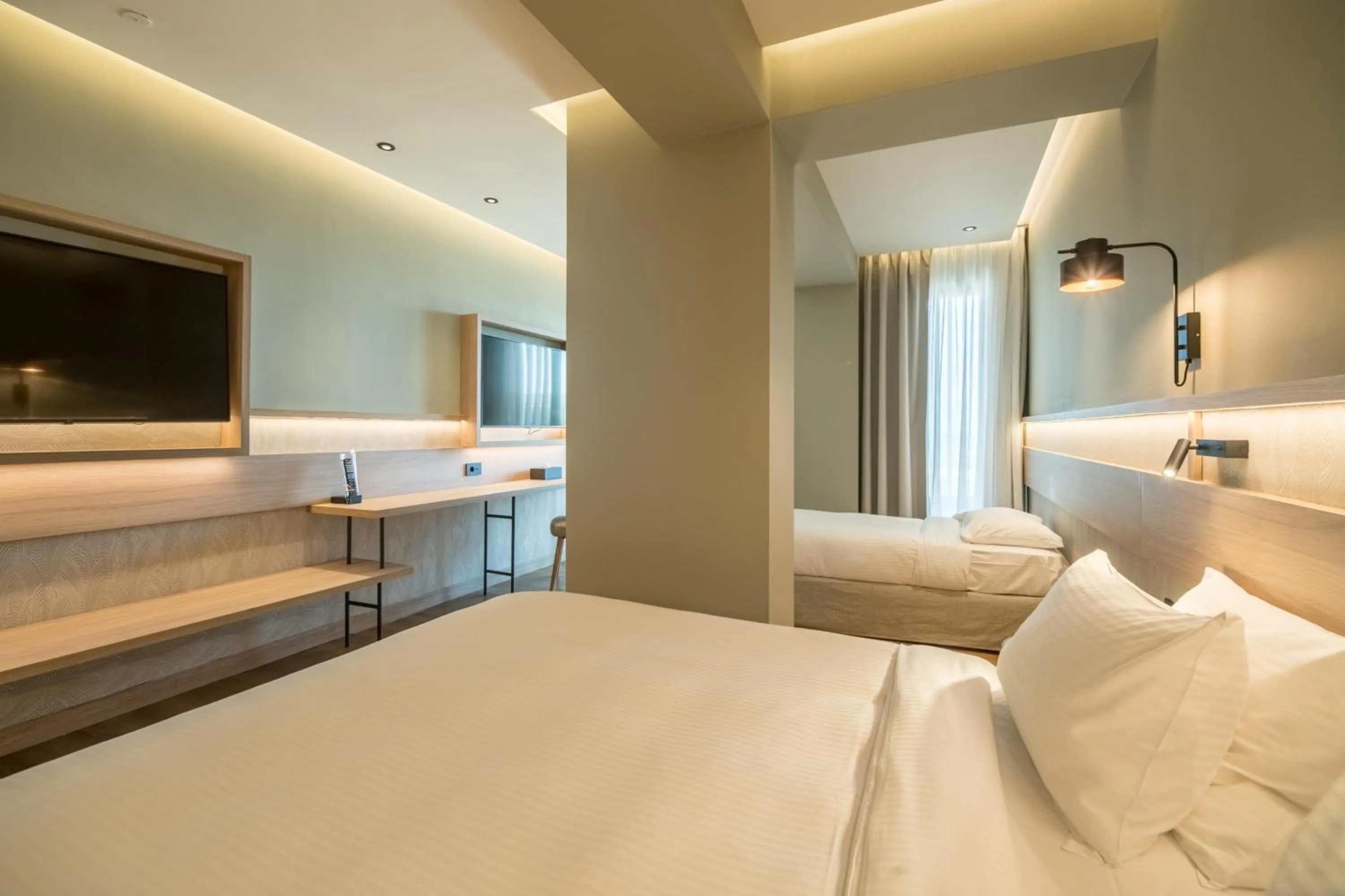 Photo of the whole room, Bed in SENSEANA Sea Side Resort & Aquadventure