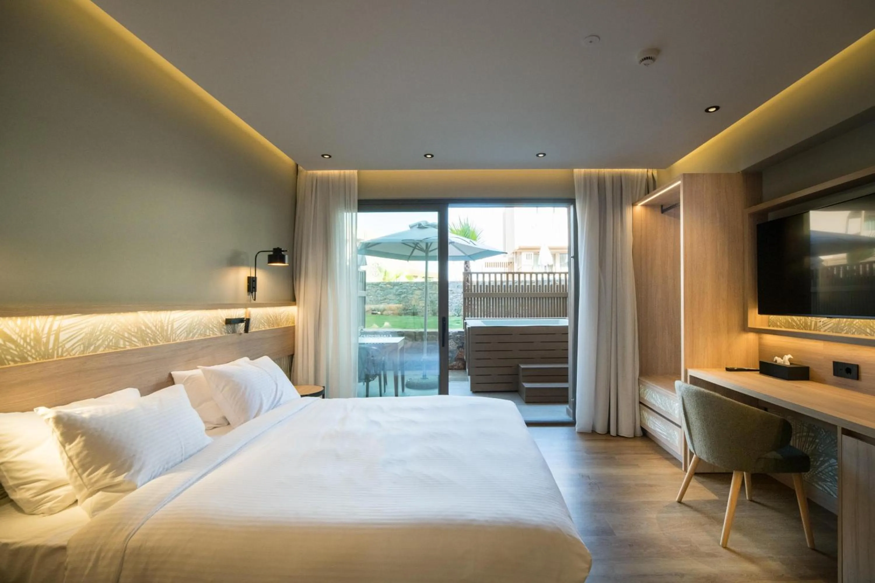 Photo of the whole room, Bed in SENSEANA Sea Side Resort & Aquadventure