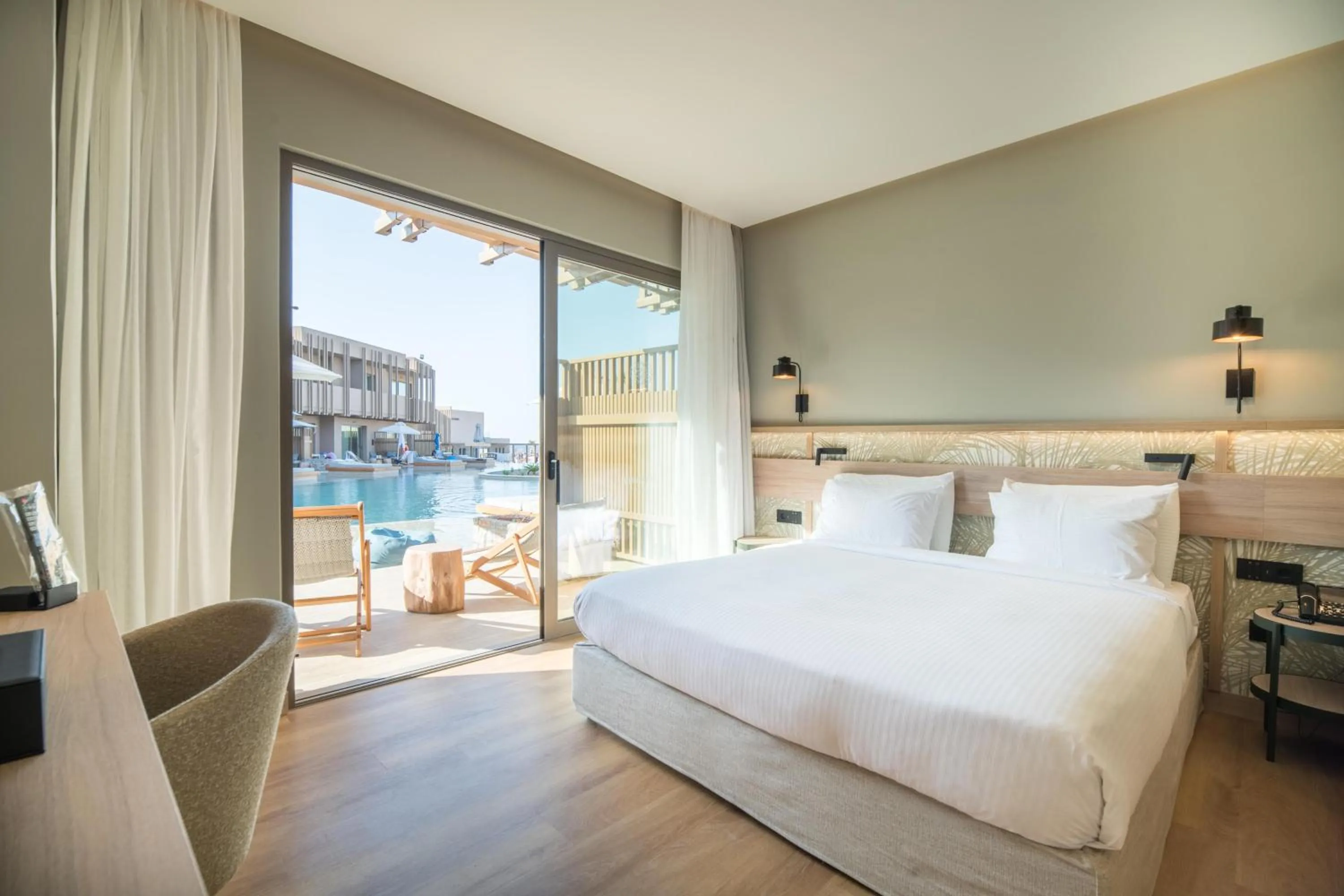 Photo of the whole room, Bed in SENSEANA Sea Side Resort & Aquadventure