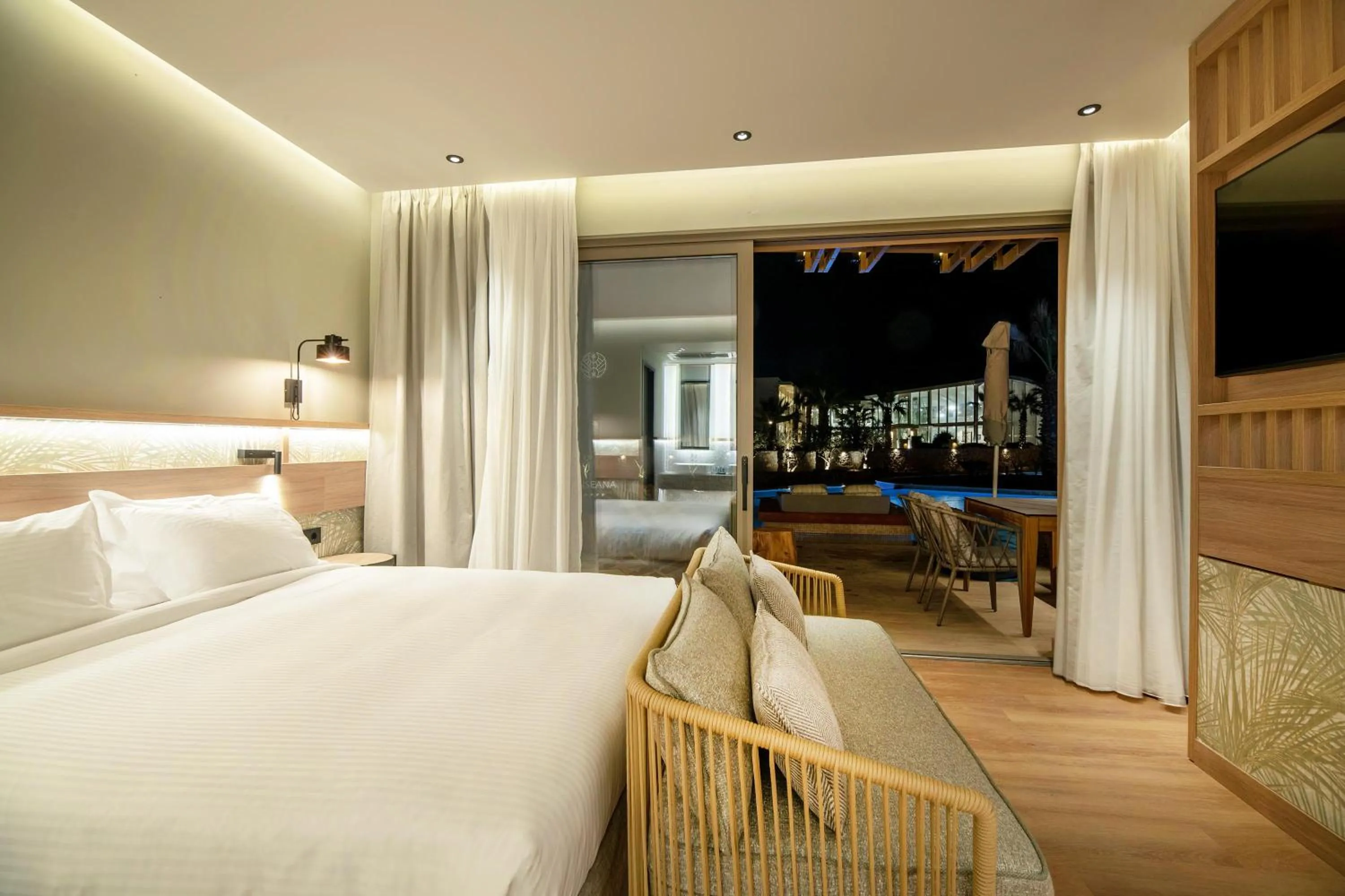 Photo of the whole room, Bed in SENSEANA Sea Side Resort & Aquadventure