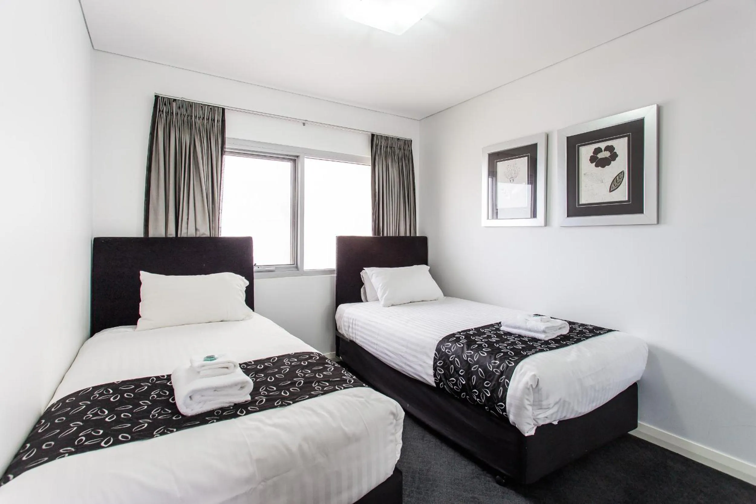 Bed in Spinnakers by Rockingham Apartments