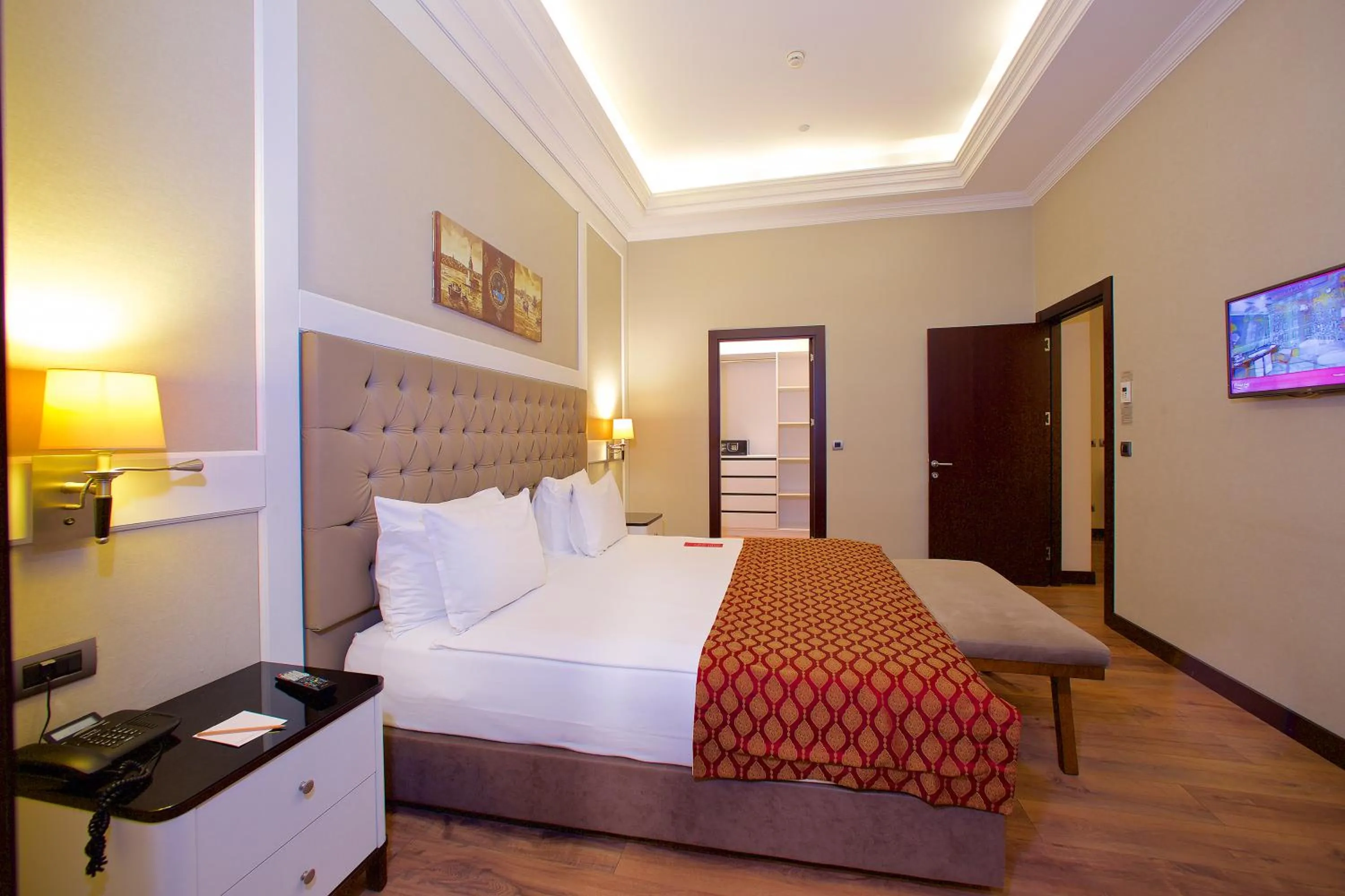 Communal lounge/ TV room, Bed in Ramada by Wyndham Istanbul Merter