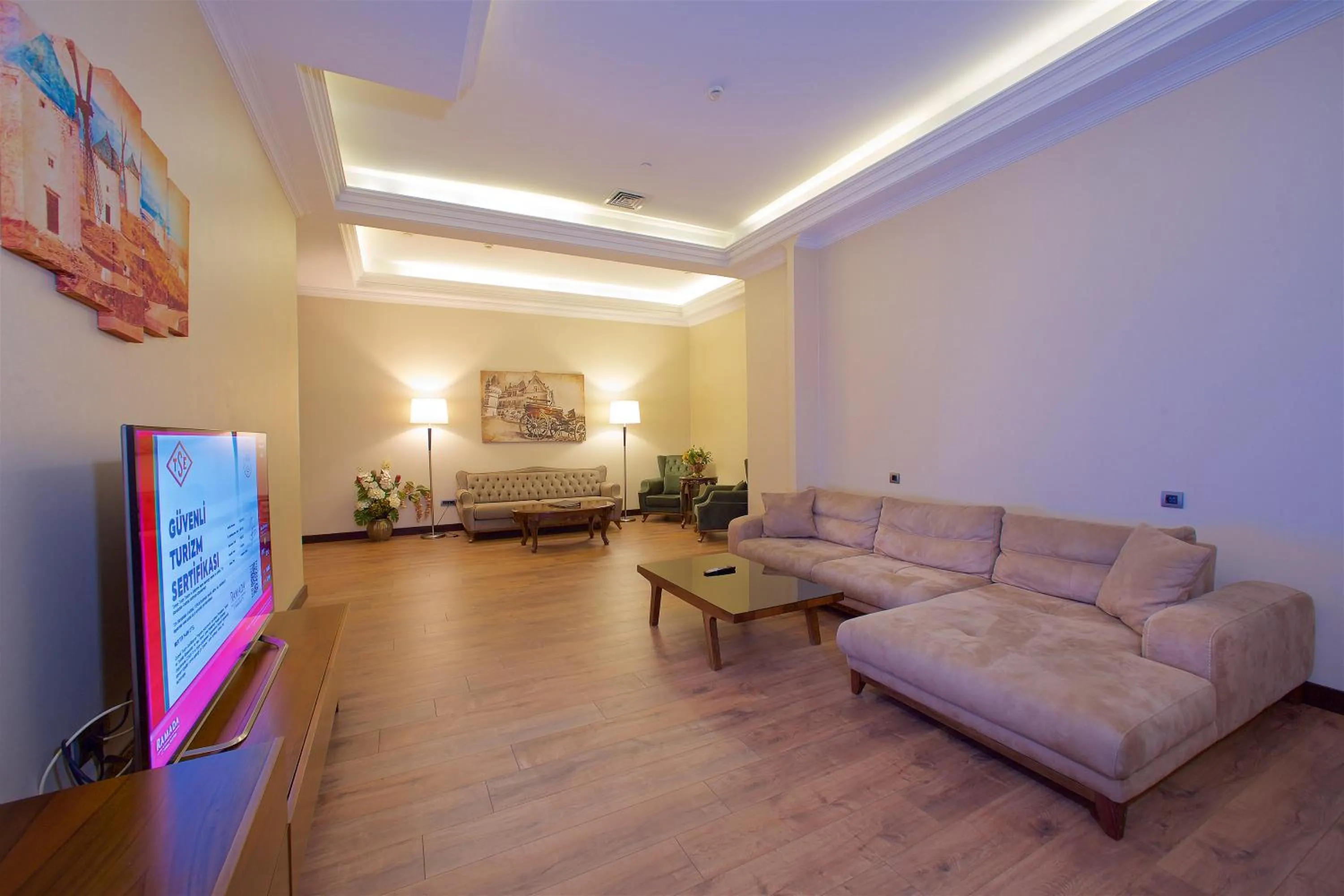 Communal lounge/ TV room in Ramada by Wyndham Istanbul Merter
