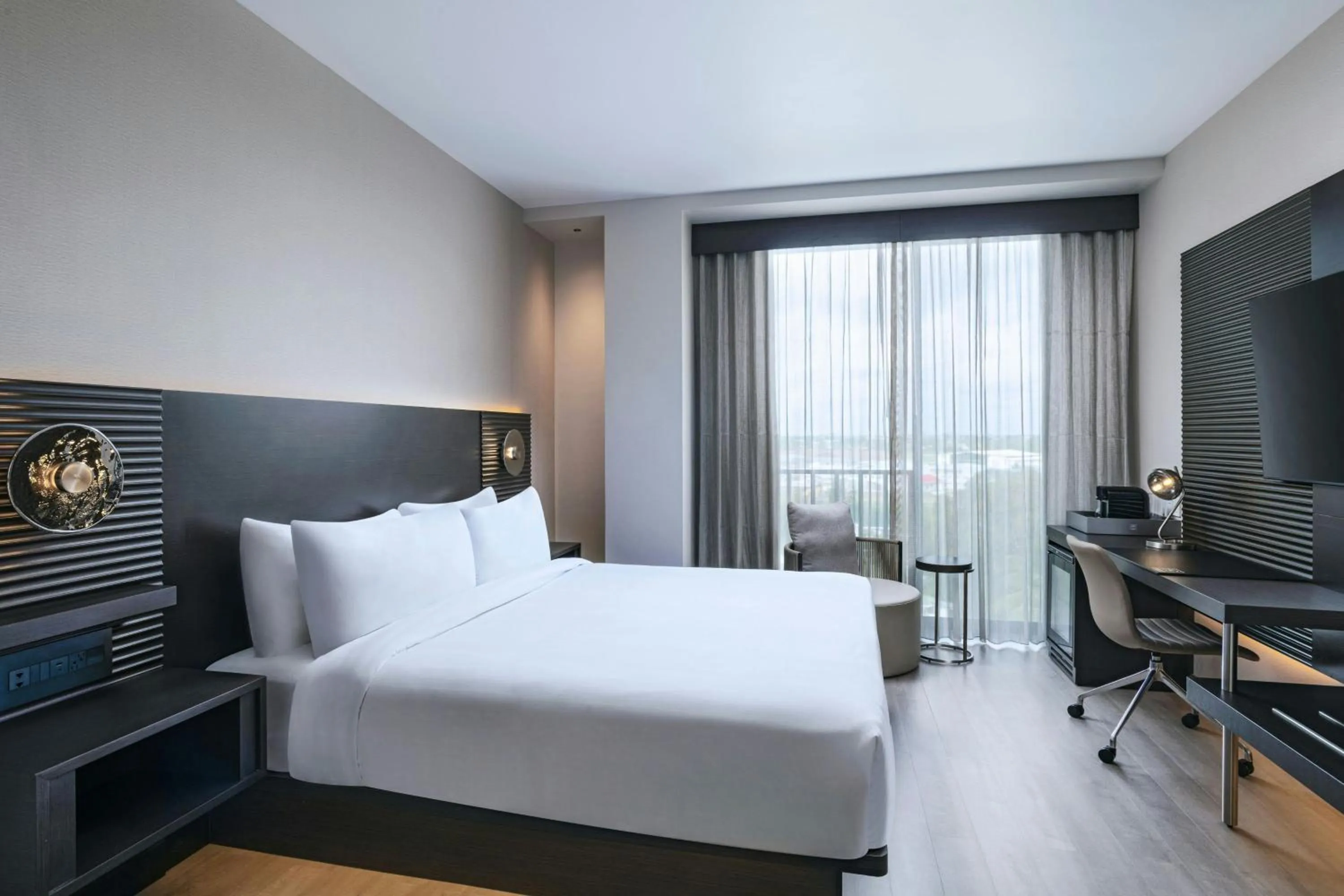 Photo of the whole room, Bed in AC Hotel by Marriott Georgetown Guyana