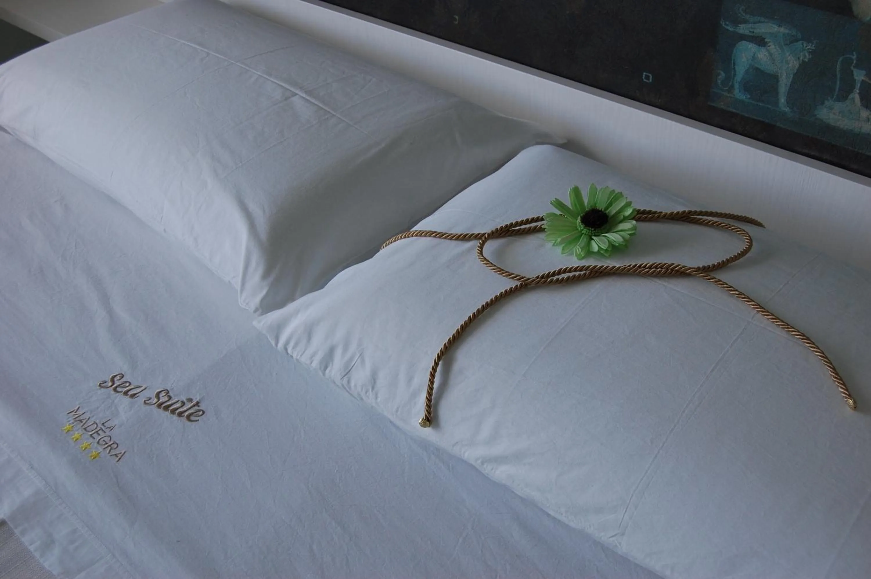 Decorative detail, Bed in La Madegra Seasuite