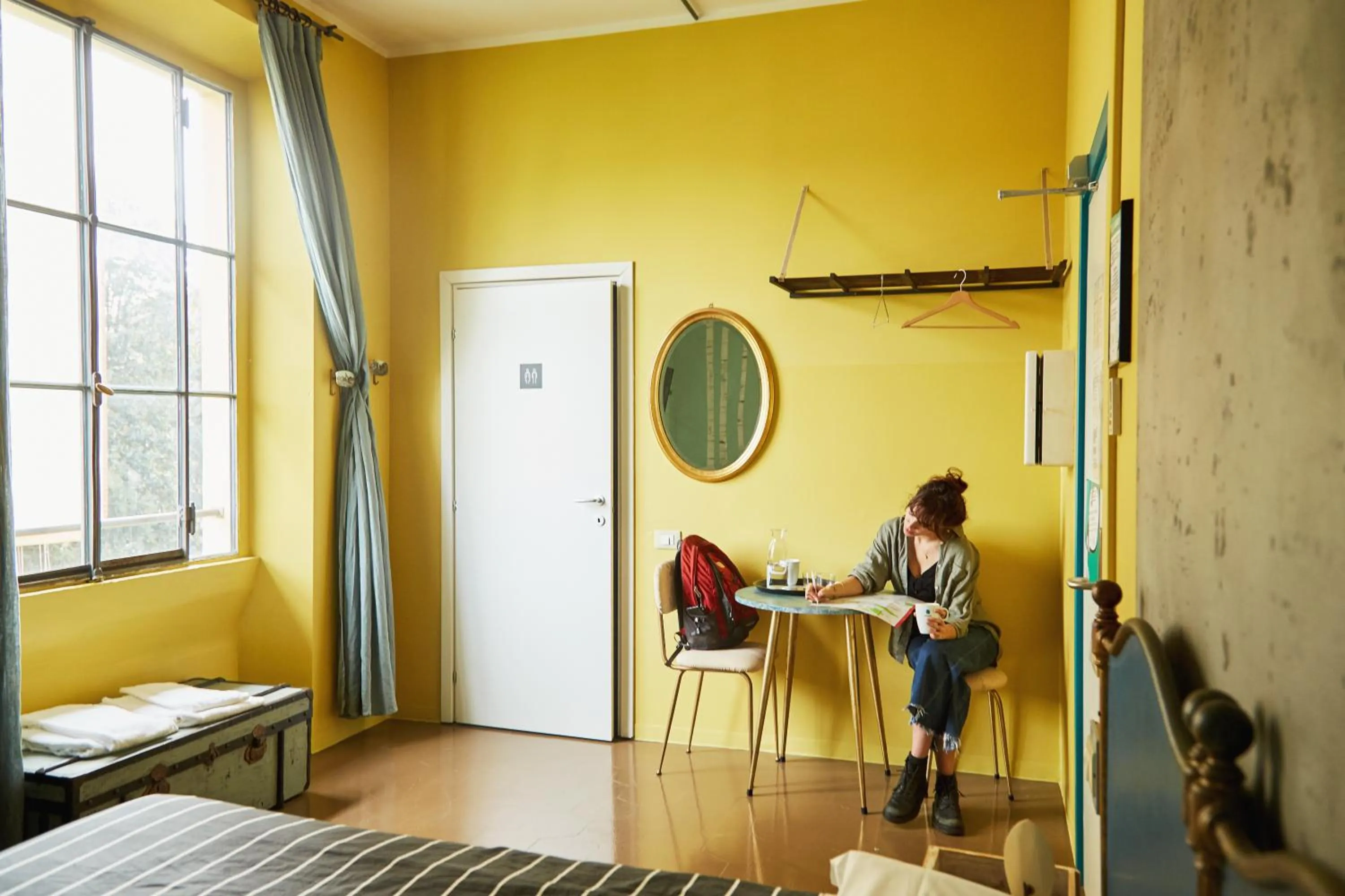 Photo of the whole room in Madama Hostel & Bistrot