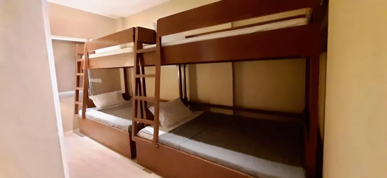 Bed in Amadeus and Isabel Inn