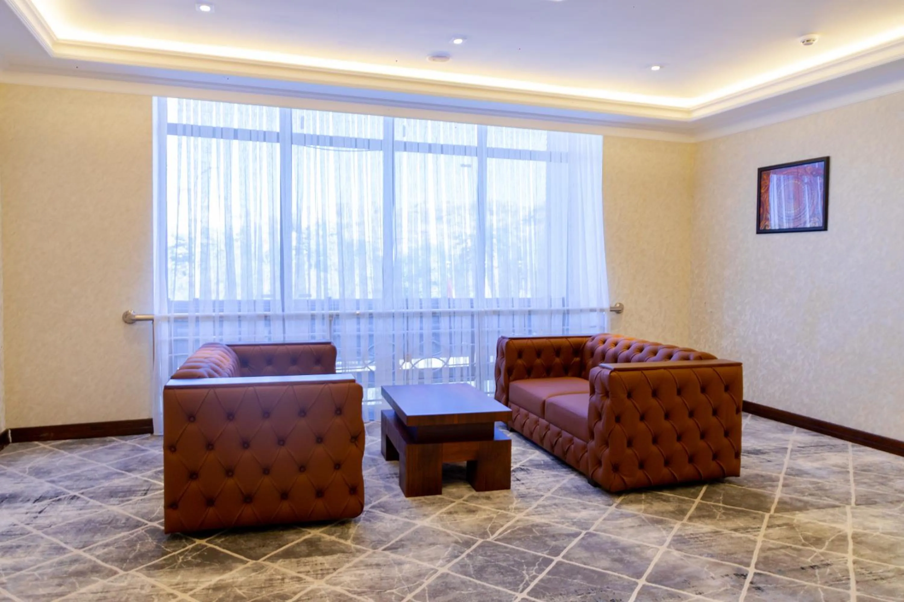 Seating area in Karvon Plaza Hotel