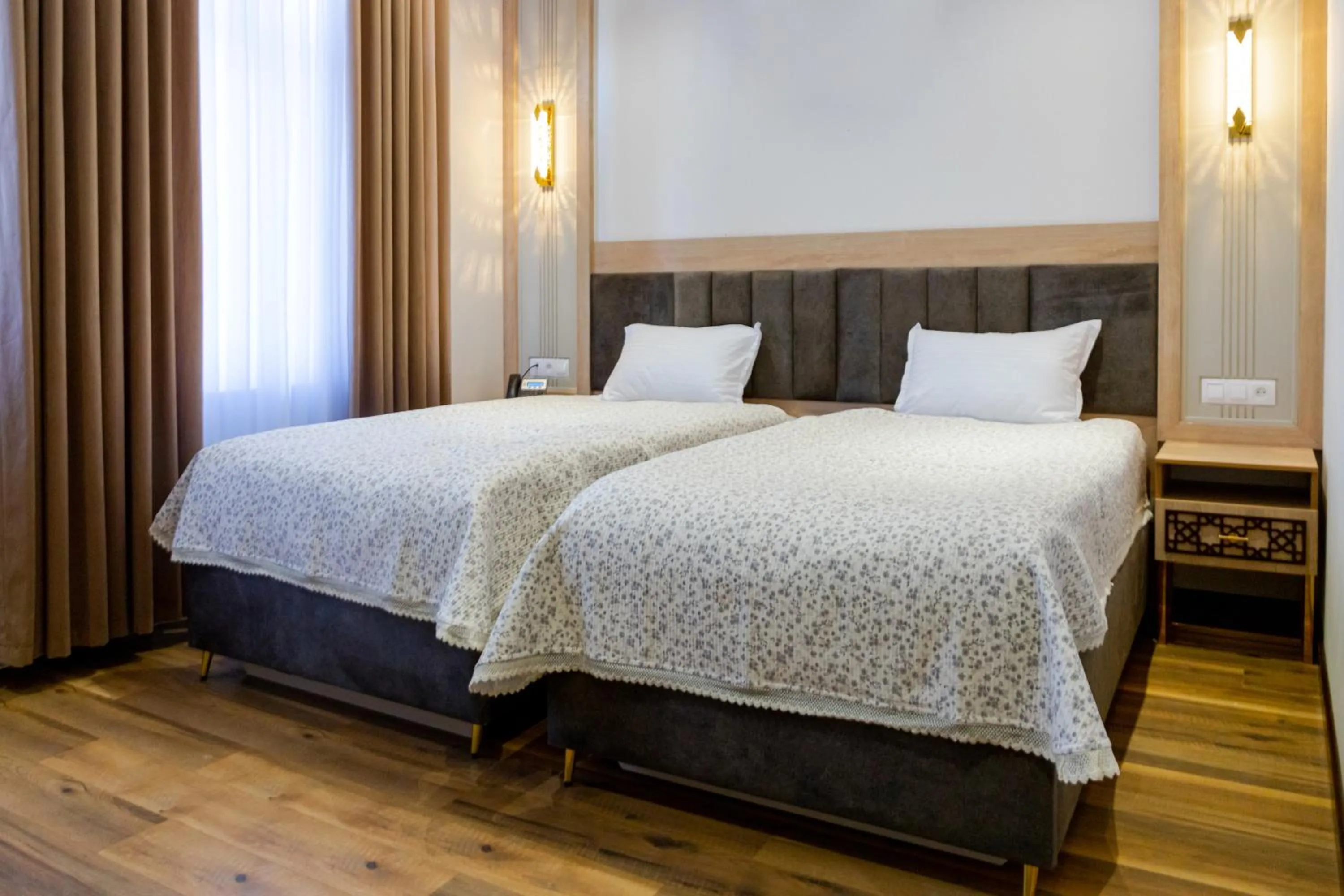 Bed in Karvon Plaza Hotel