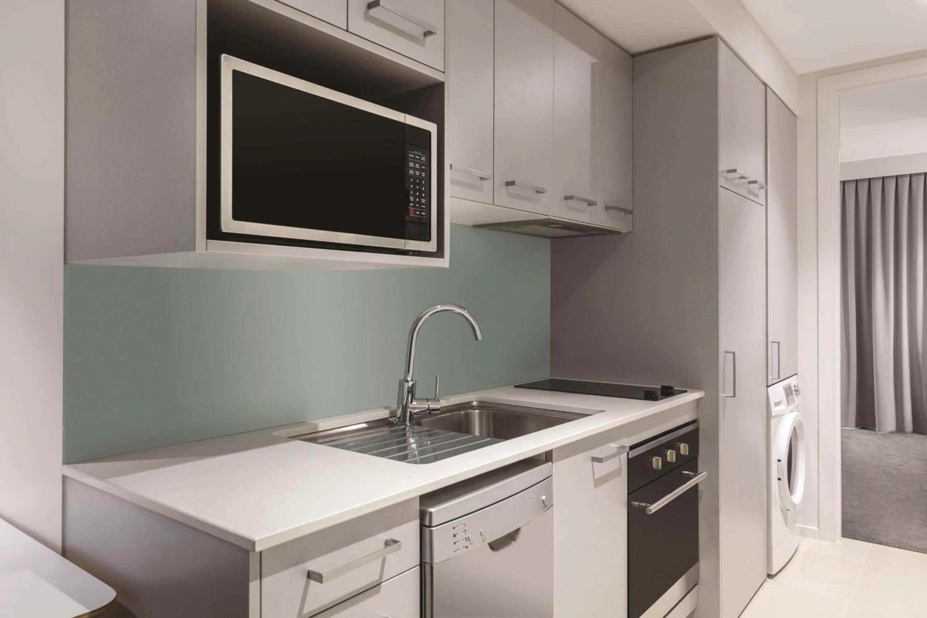 Kitchen or kitchenette in Adina Apartment Hotel Auckland Britomart