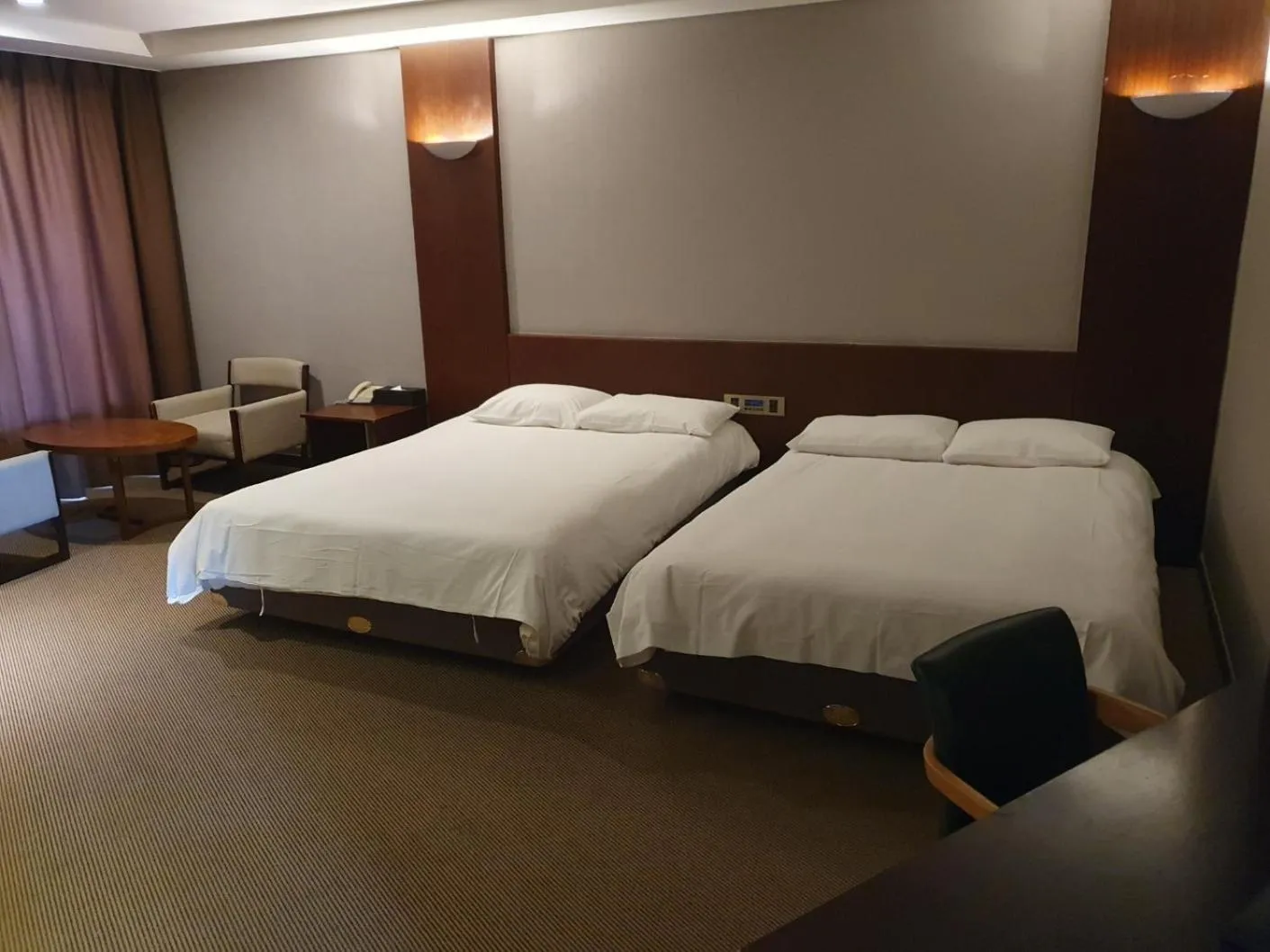 Bed in Mstay Hotel