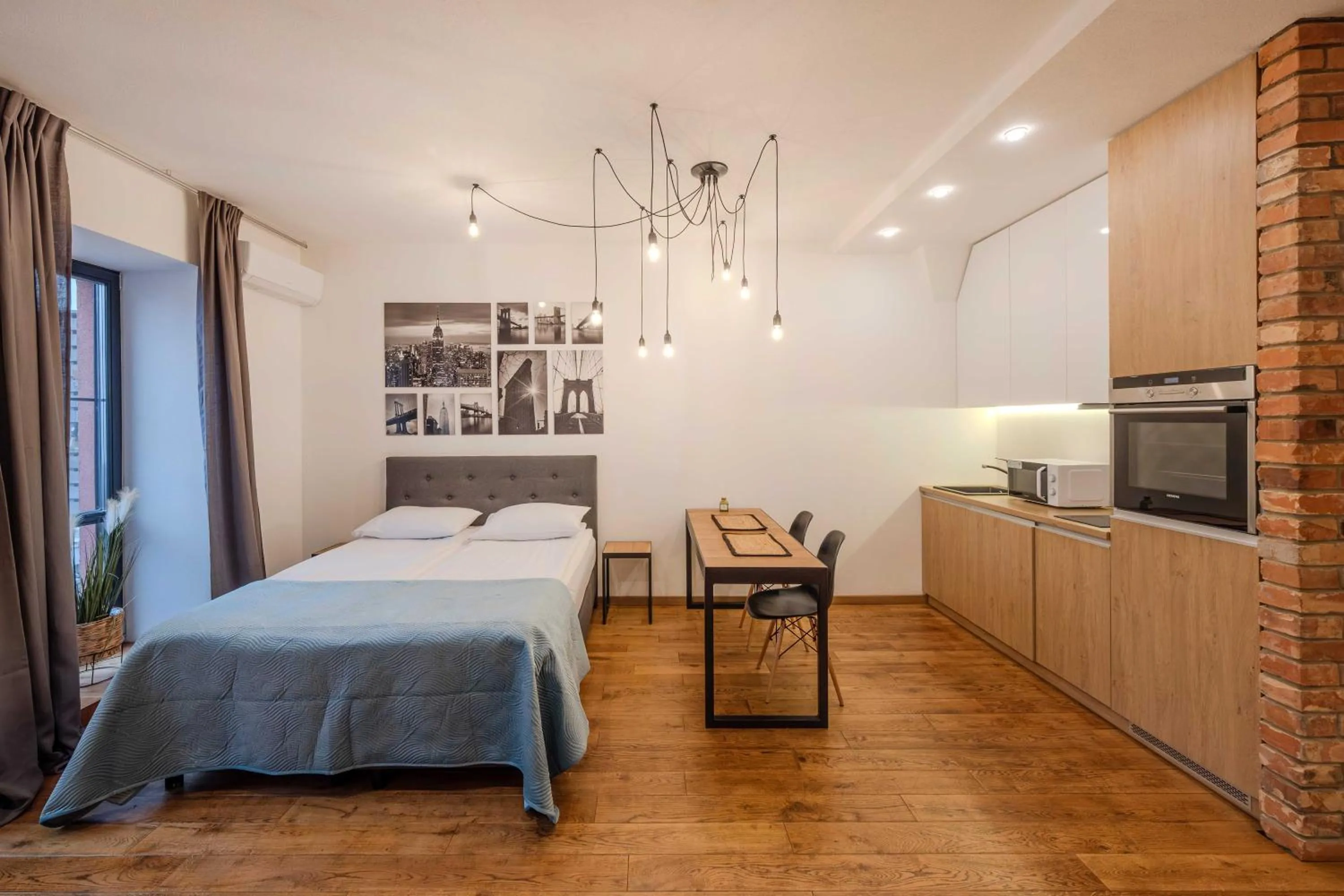 kitchen, Bed in King Mindaugas Apartments