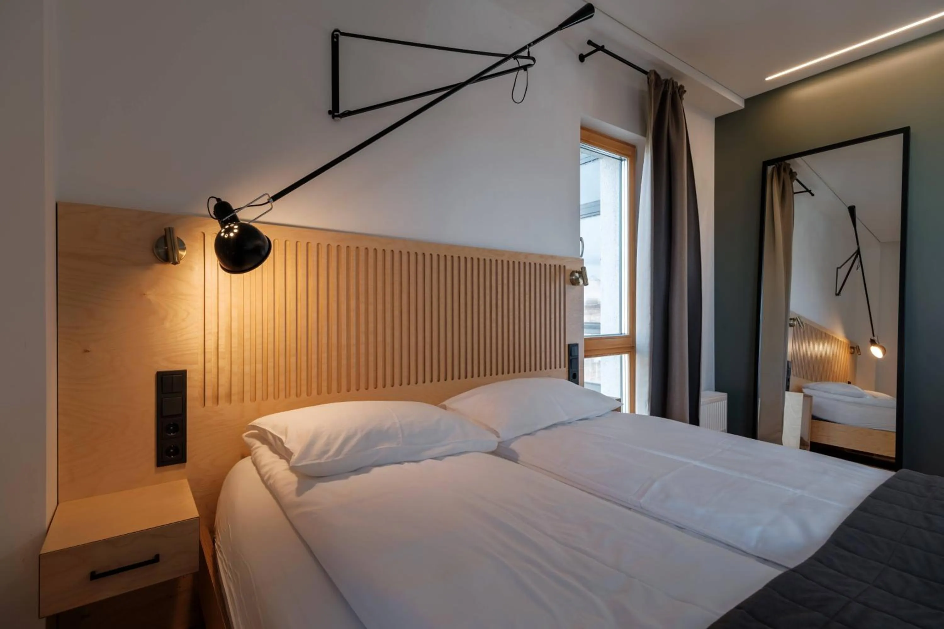 Bed in King Mindaugas Apartments