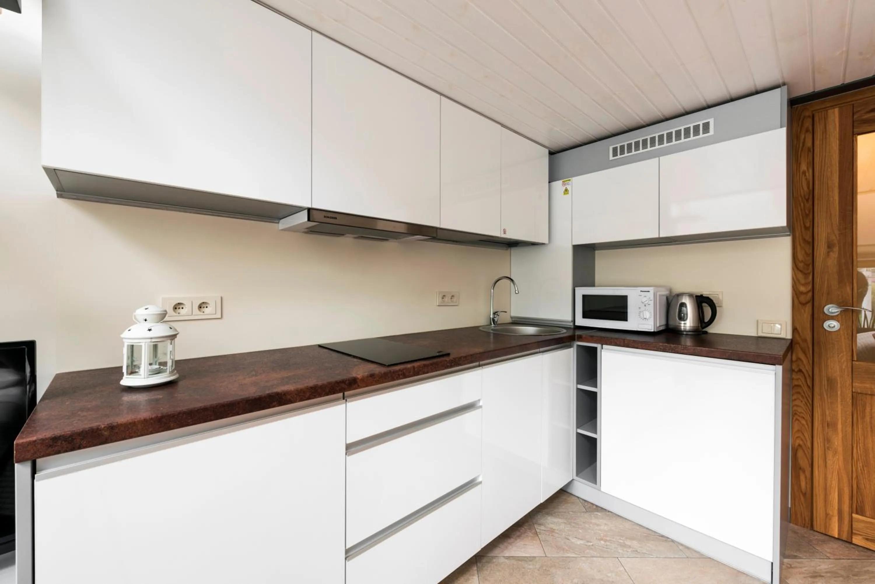 Kitchen or kitchenette in King Mindaugas Apartments