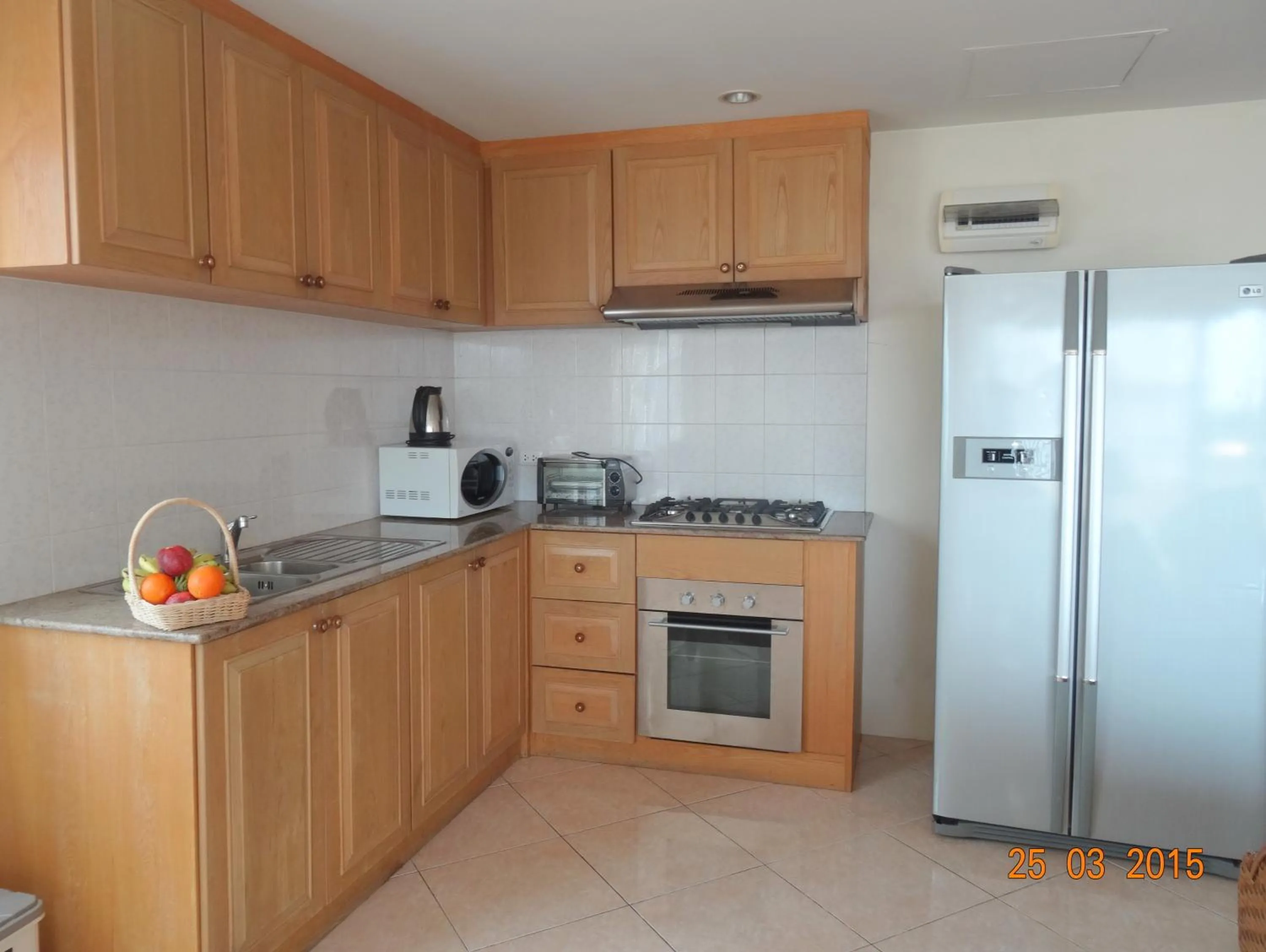 Living room, Kitchen/Kitchenette in Butterfly Garden Boutique Residences by Luxury View SHA Extra Plus