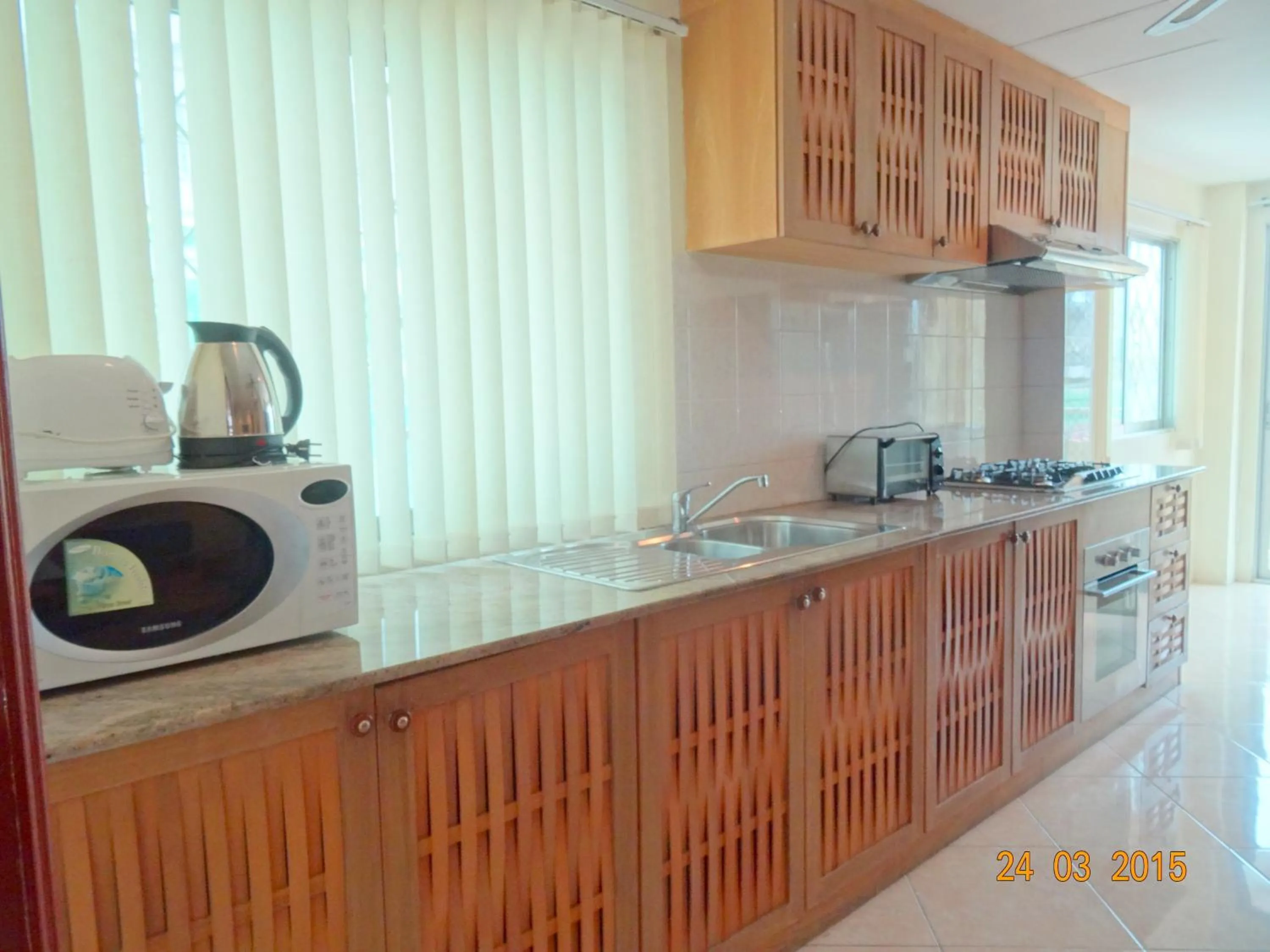 Coffee/tea facilities, Kitchen/Kitchenette in Butterfly Garden Boutique Residences by Luxury View SHA Extra Plus