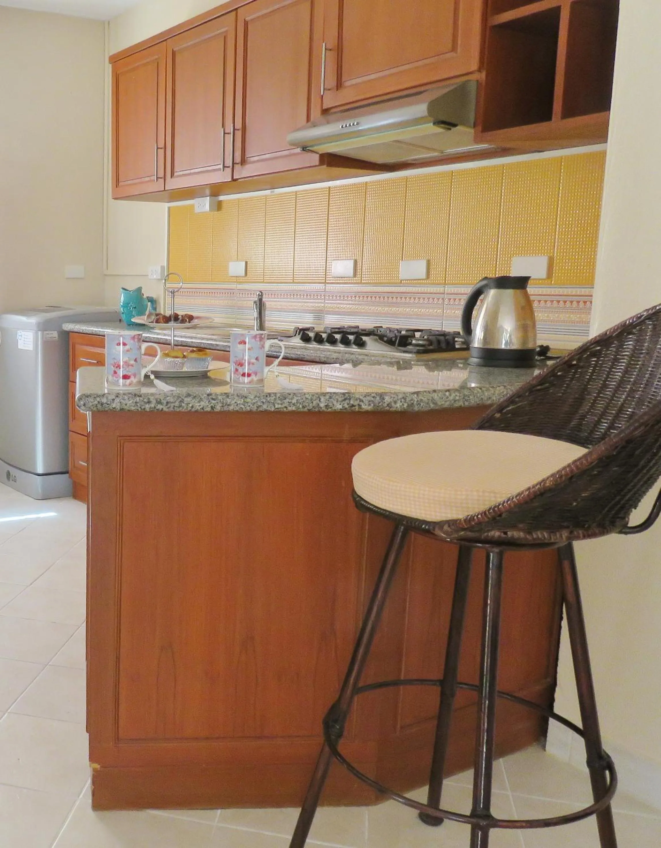 Coffee/tea facilities, Kitchen/Kitchenette in Butterfly Garden Boutique Residences by Luxury View SHA Extra Plus