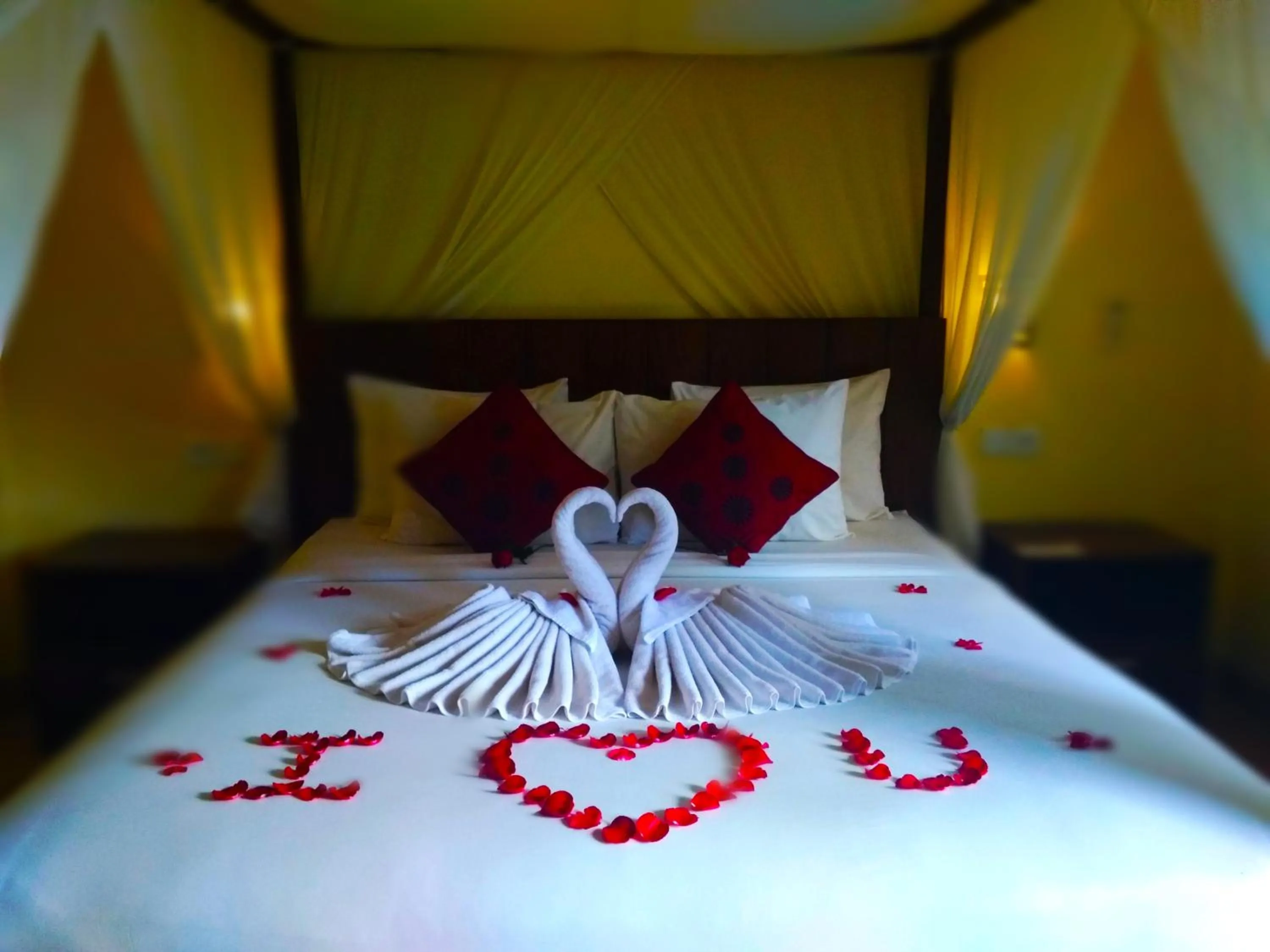 Bed in Kartika Bungalows