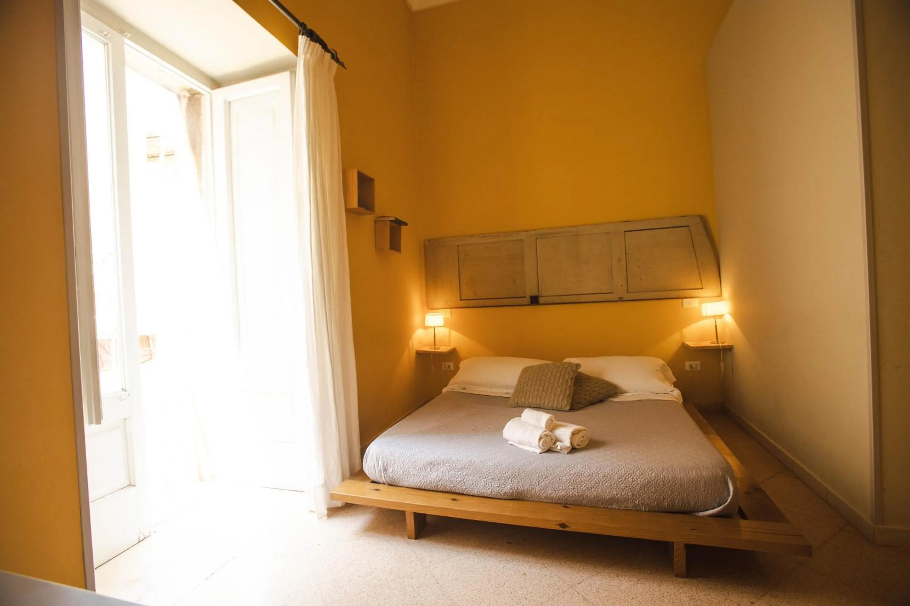 Bed in 4 Balconi rooms-Boutique B&B