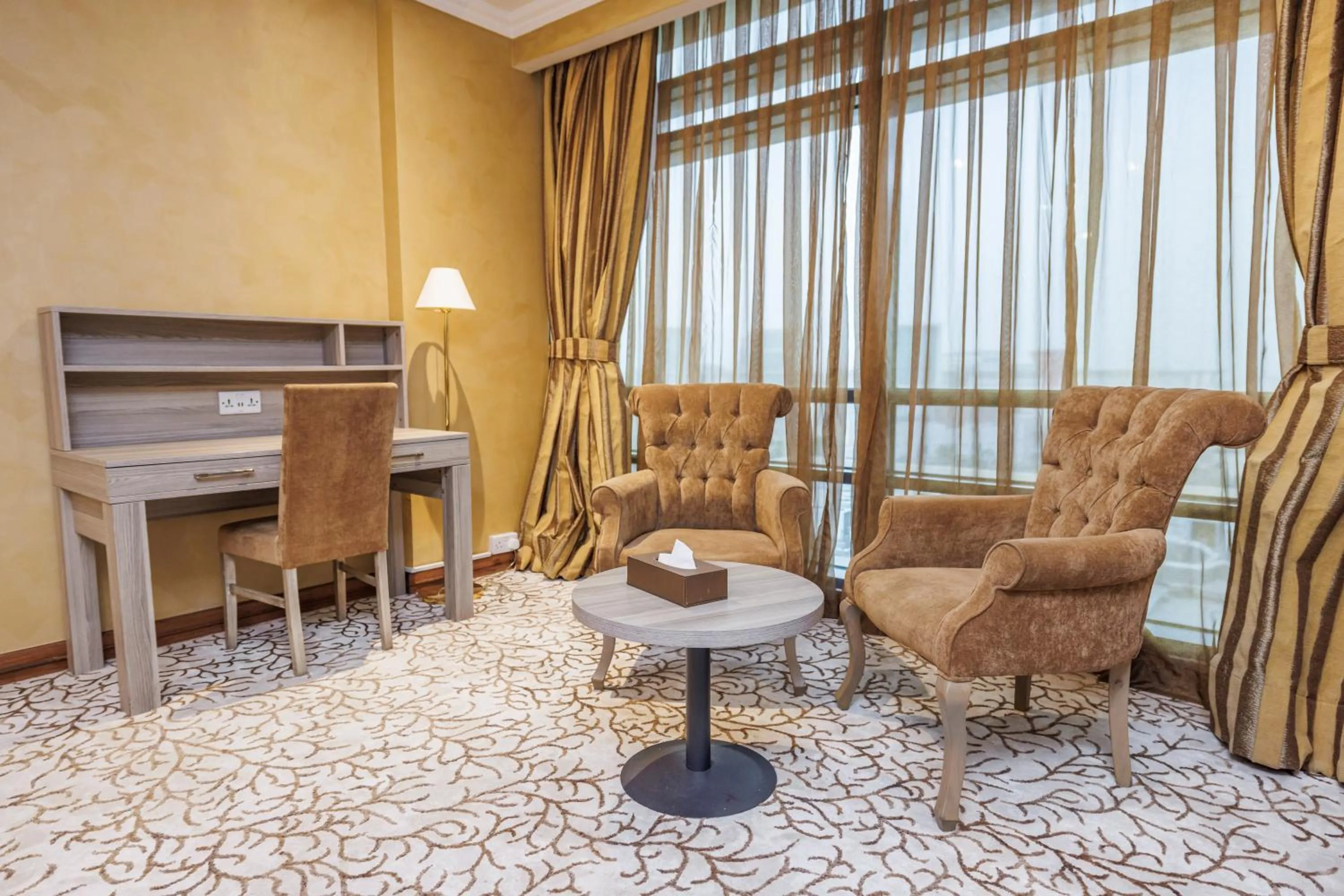 Seating area in Sapphire Plaza Hotel