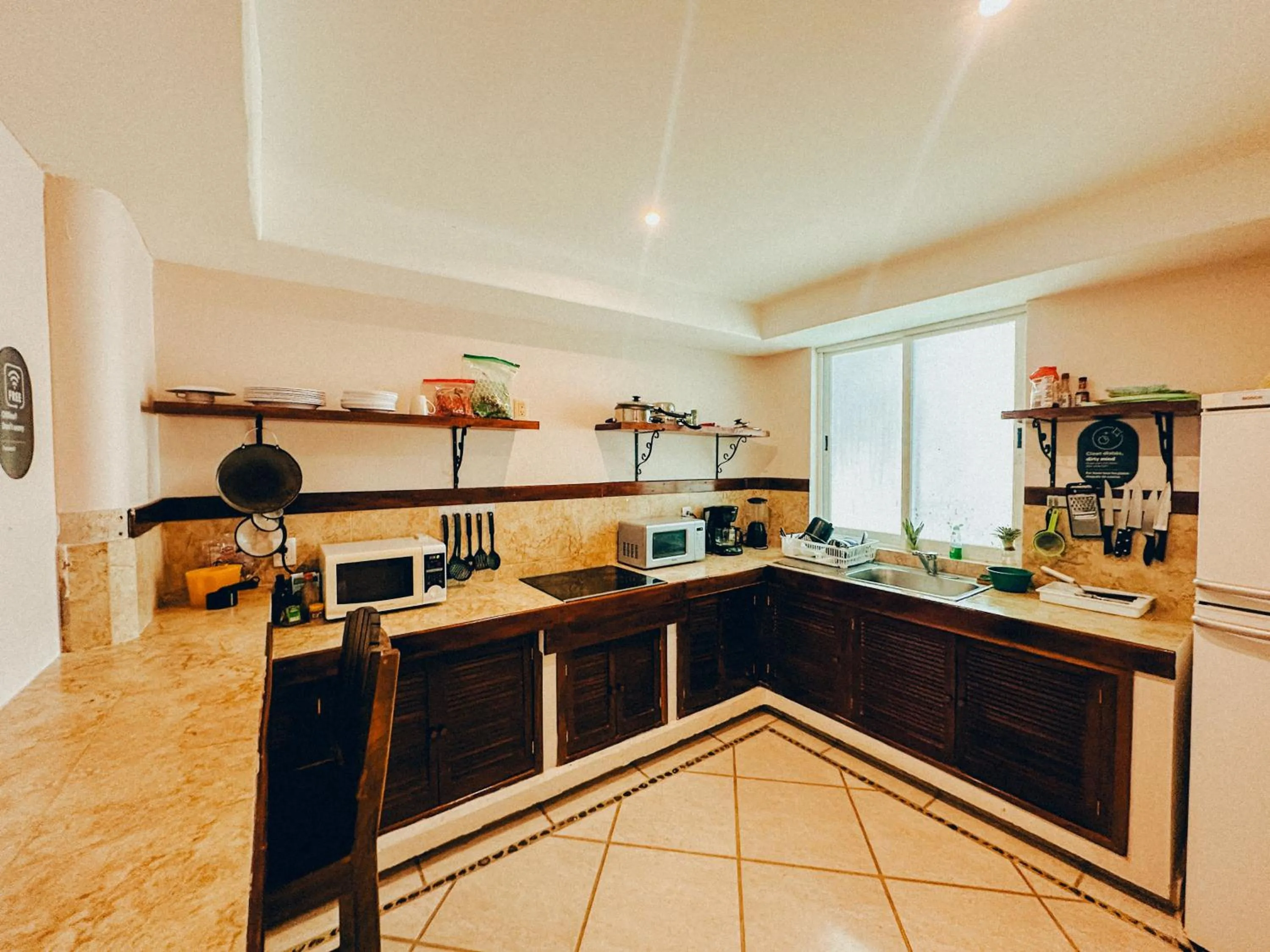Communal kitchen in Viajero Bacalar Hostel