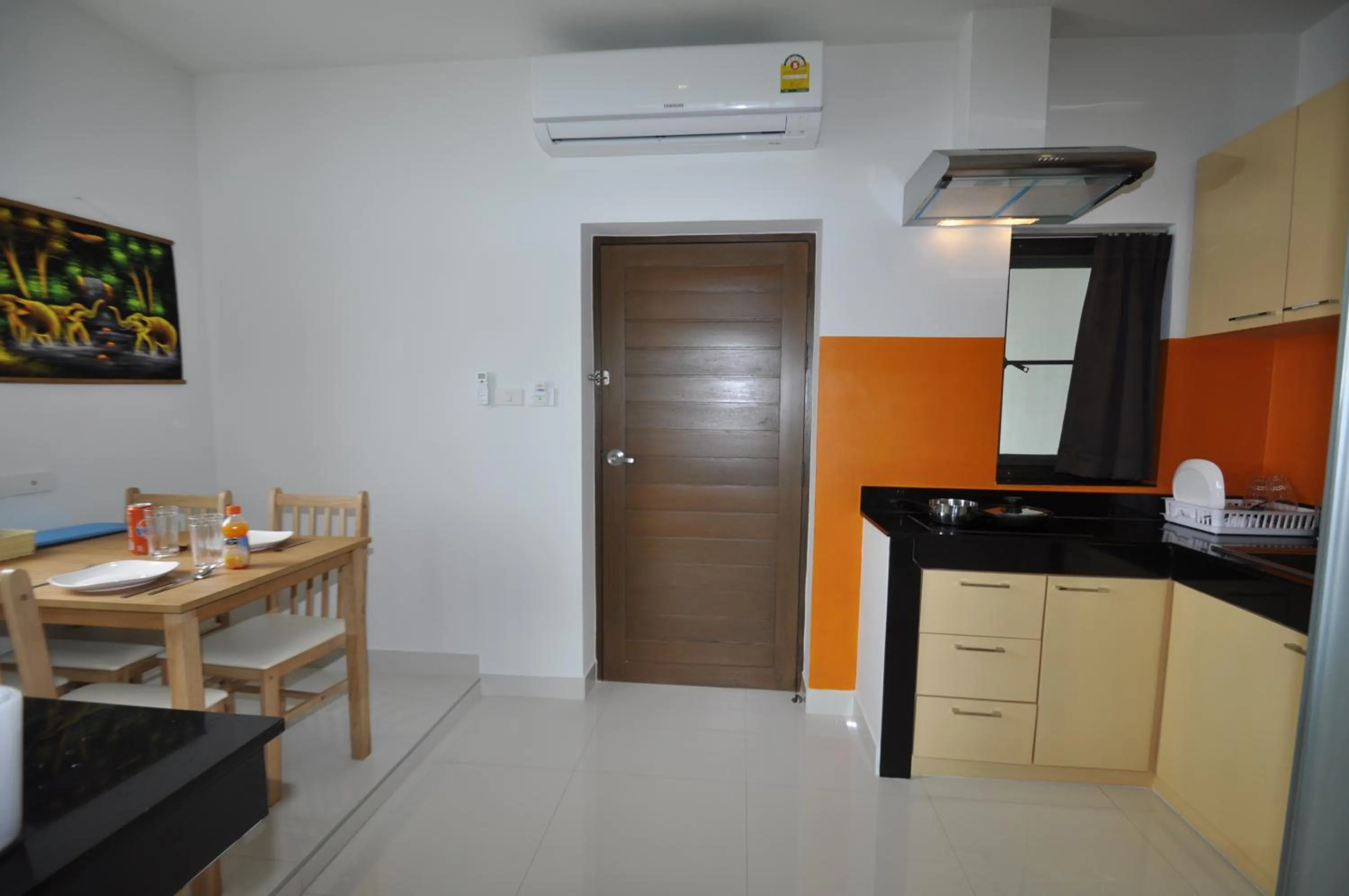 Kitchen or kitchenette in Duangjai Residence, Rooms & Apartments