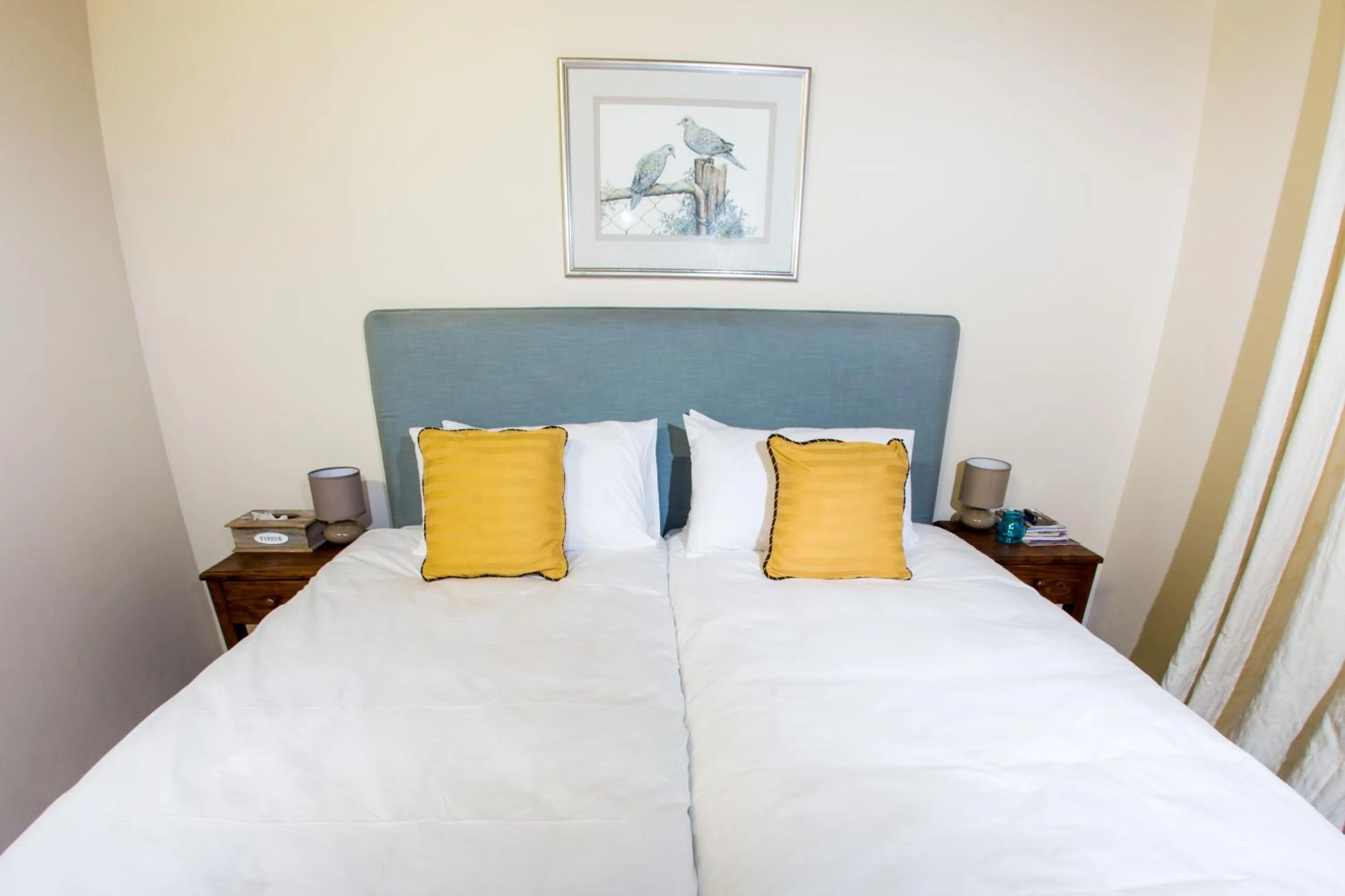 Bed in Winelands Villa Guesthouse and Cottages