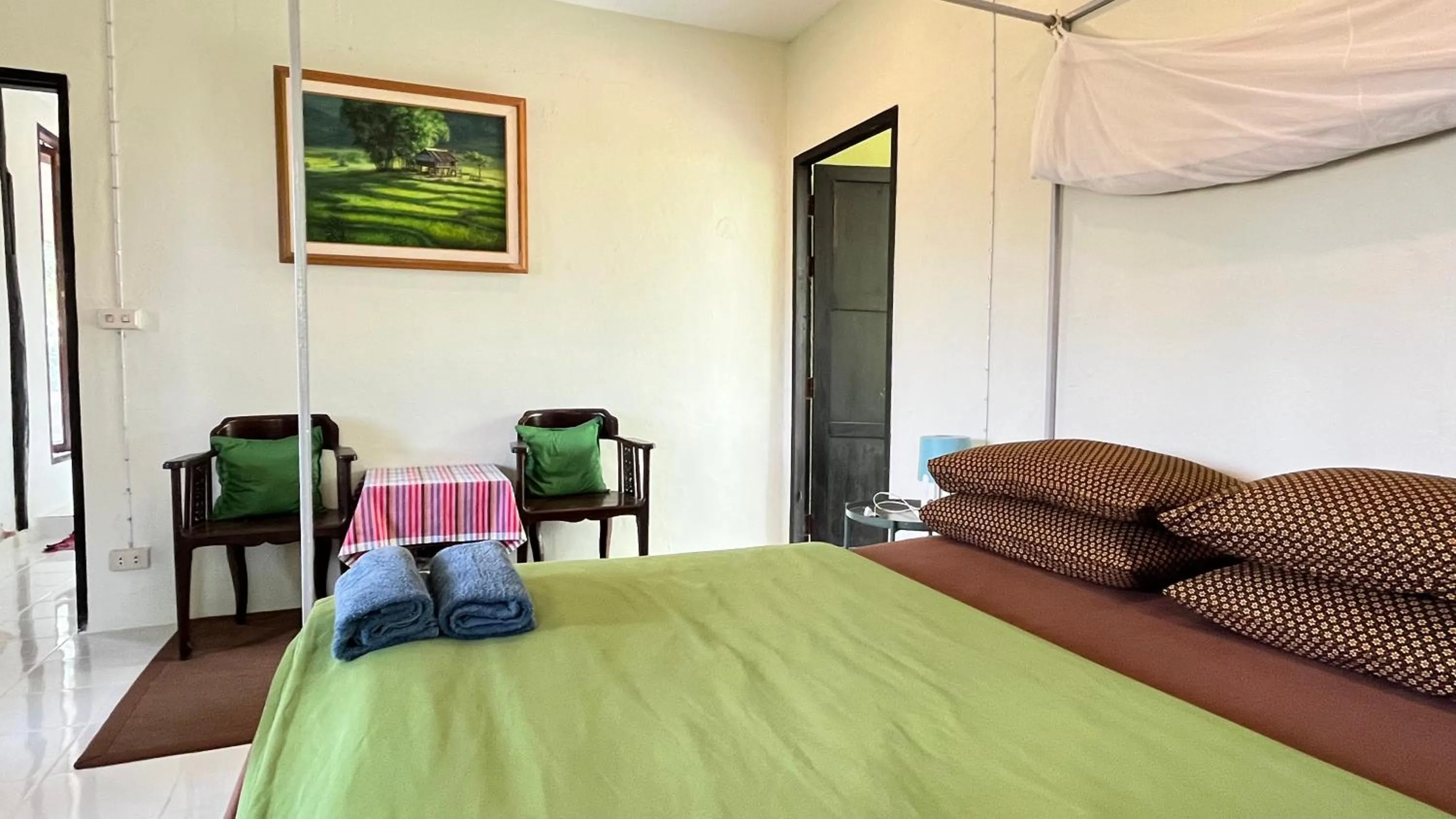 Bed in Bannamhoo Bungalows