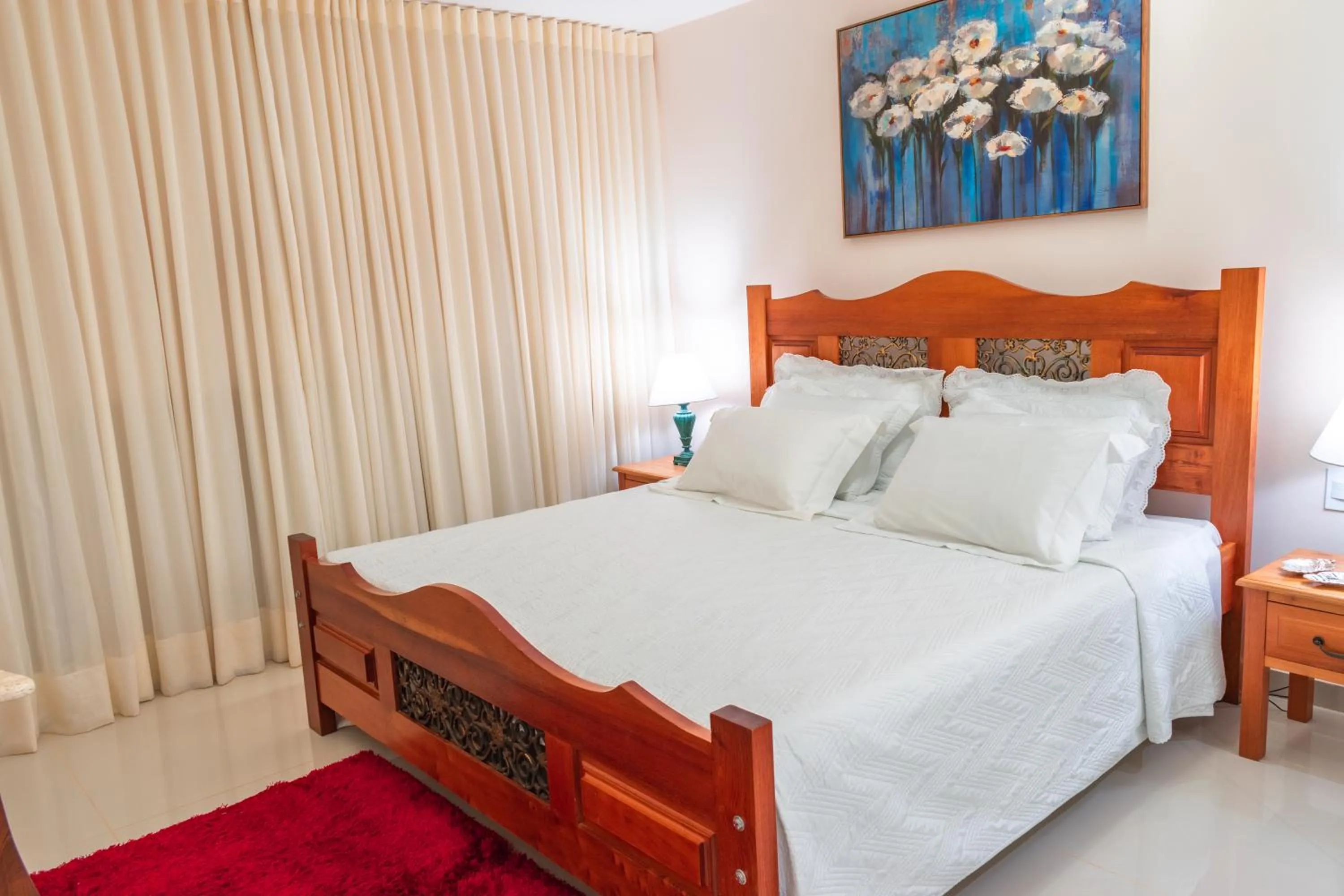 Bed in BellaMinas Pousada