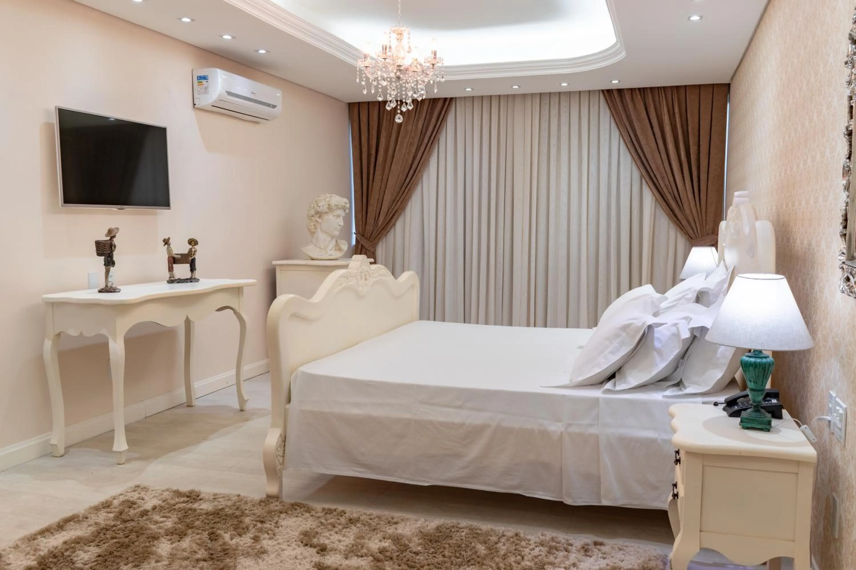 Bed in BellaMinas Pousada