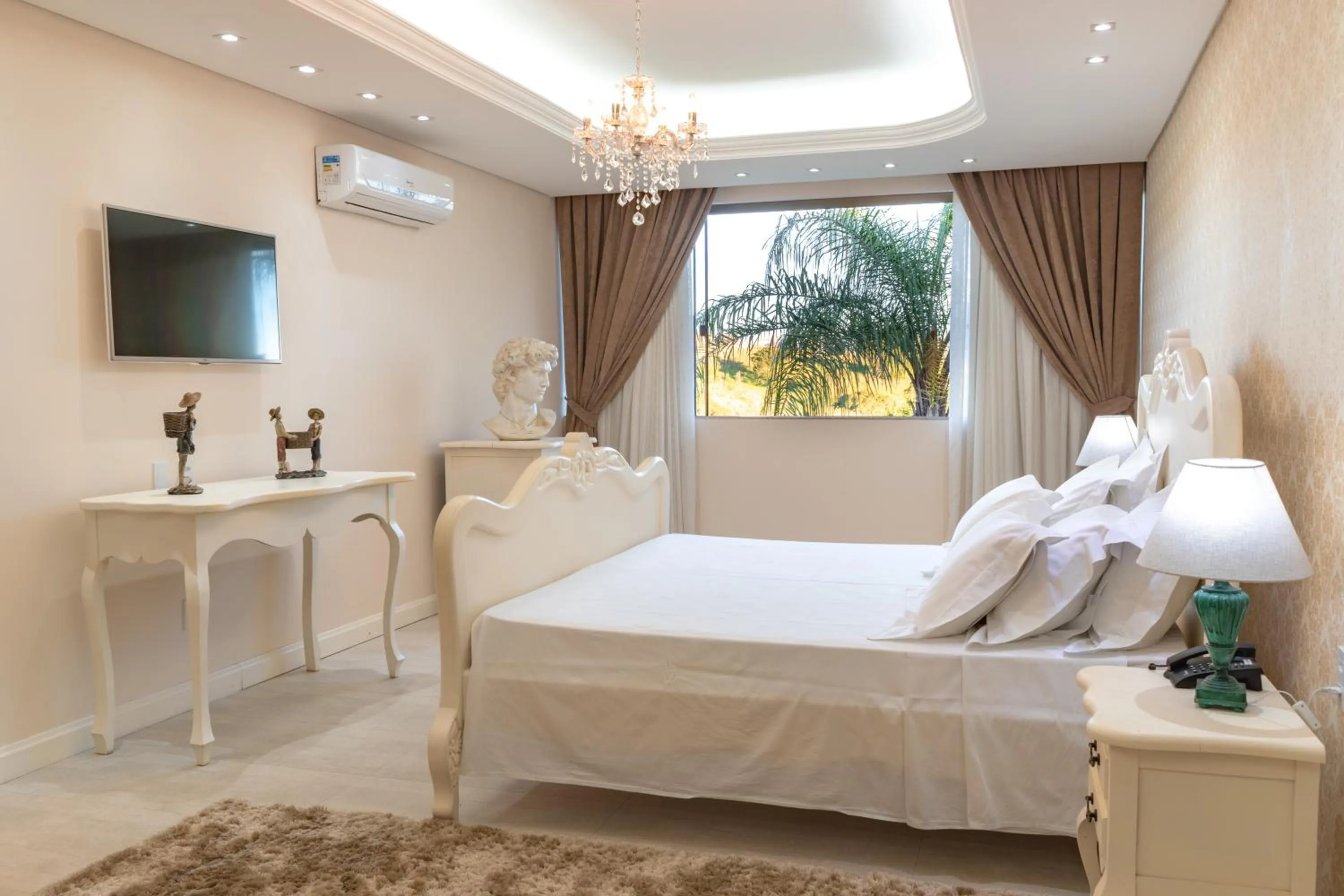 Bed in BellaMinas Pousada