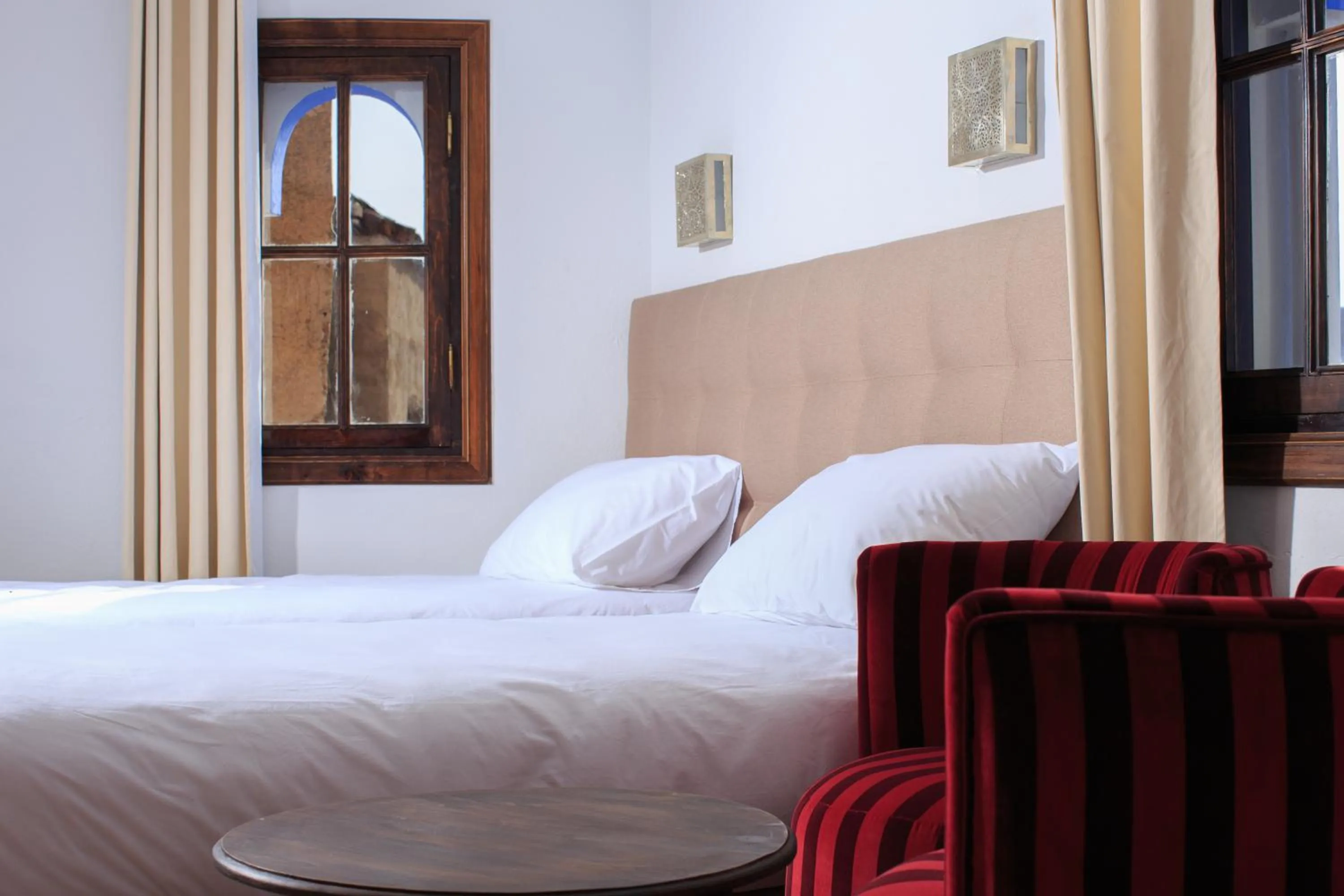 Bed in Riad Zaitouna Chaouen