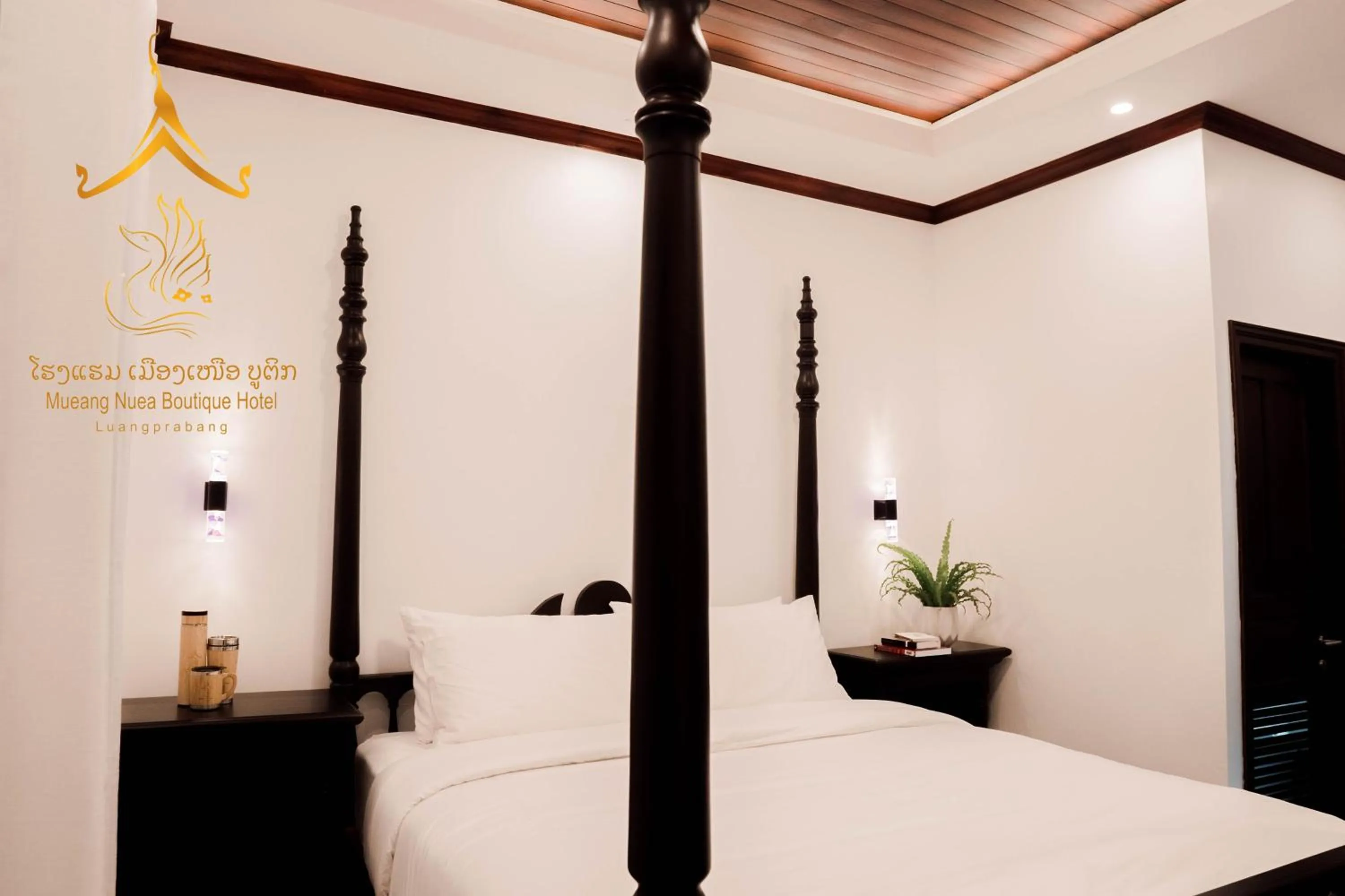 Bed in Mueang Nuea Boutique Hotel