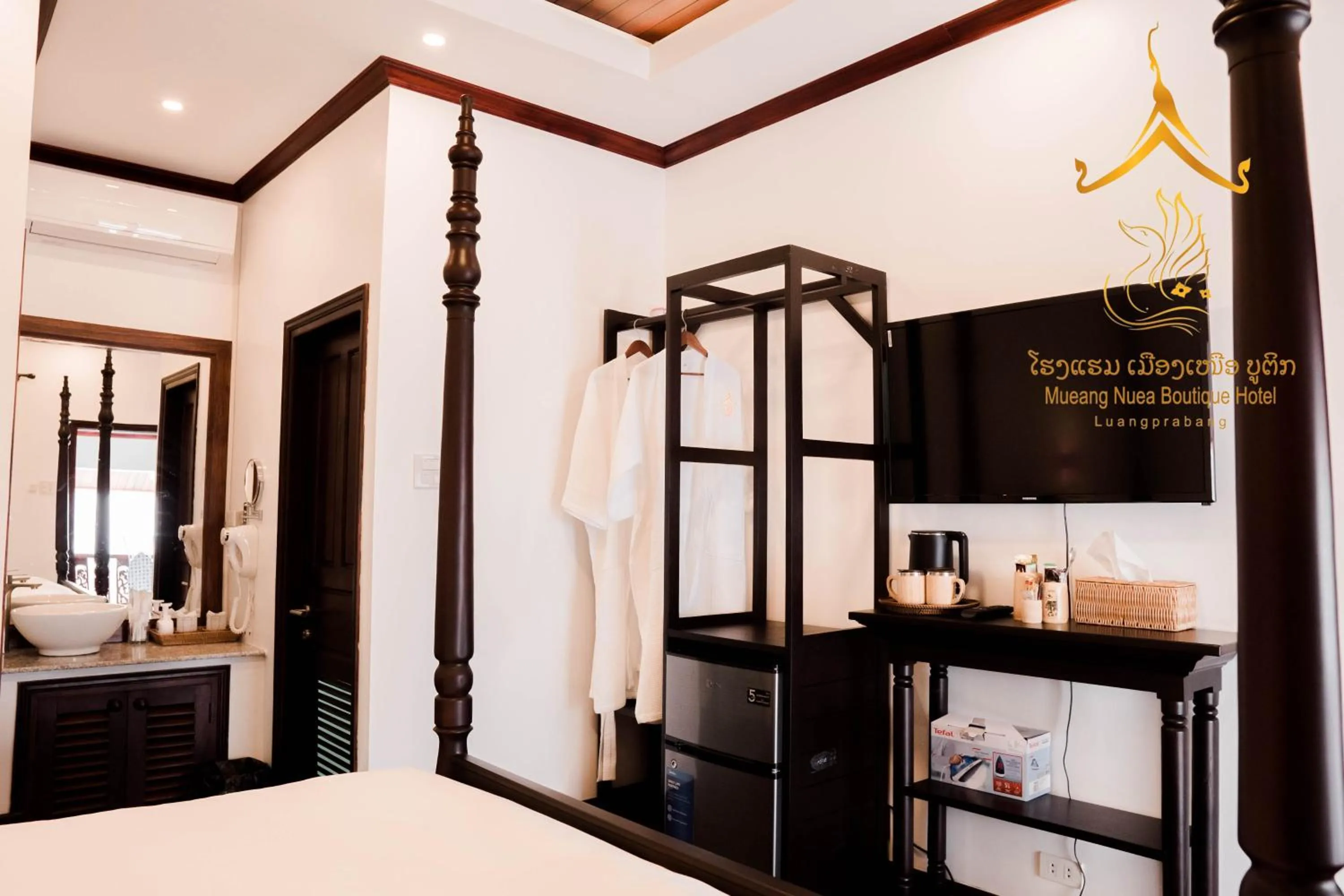 Photo of the whole room, Bed in Mueang Nuea Boutique Hotel