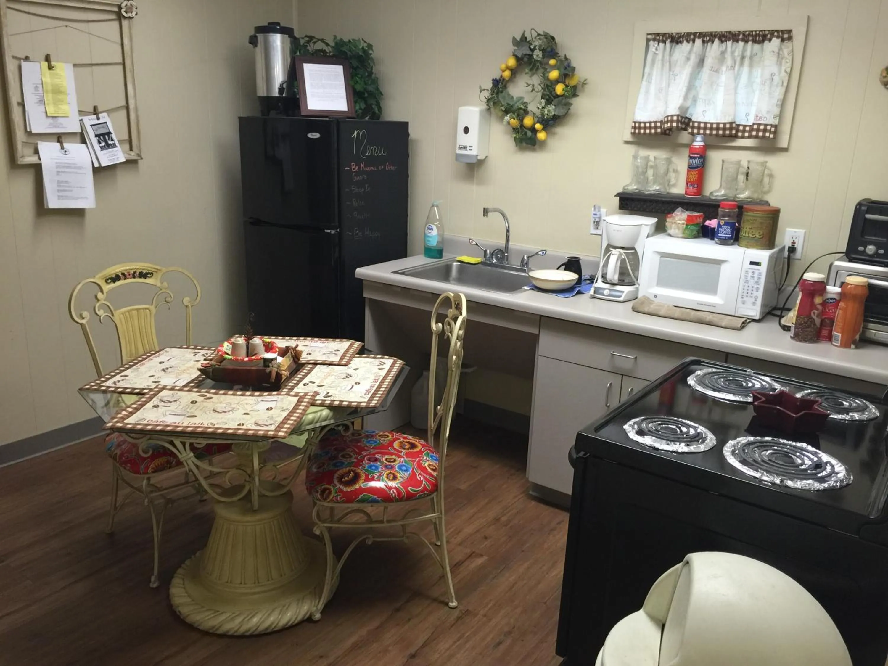 Communal kitchen in A Place to Stay Rooms