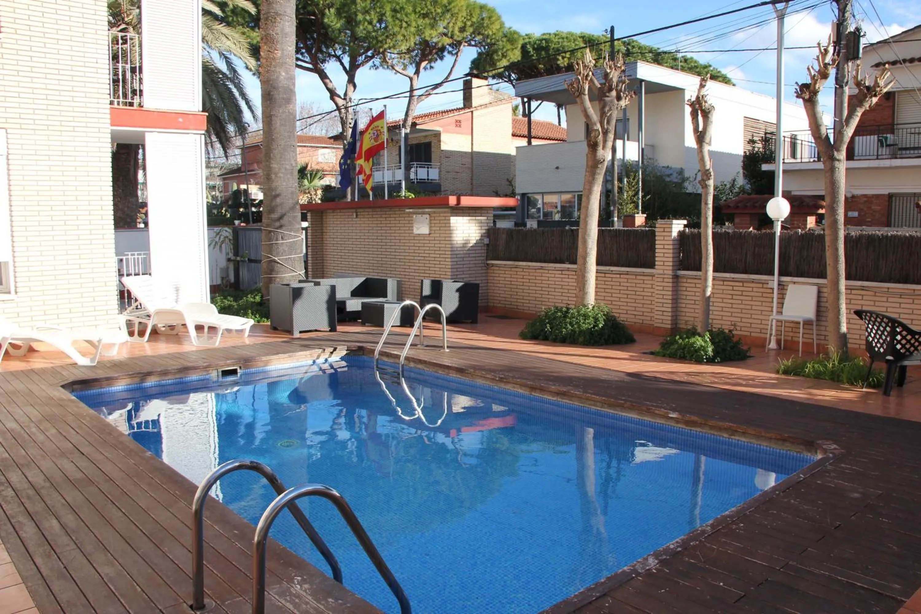 Swimming pool in Apartamentos CARU