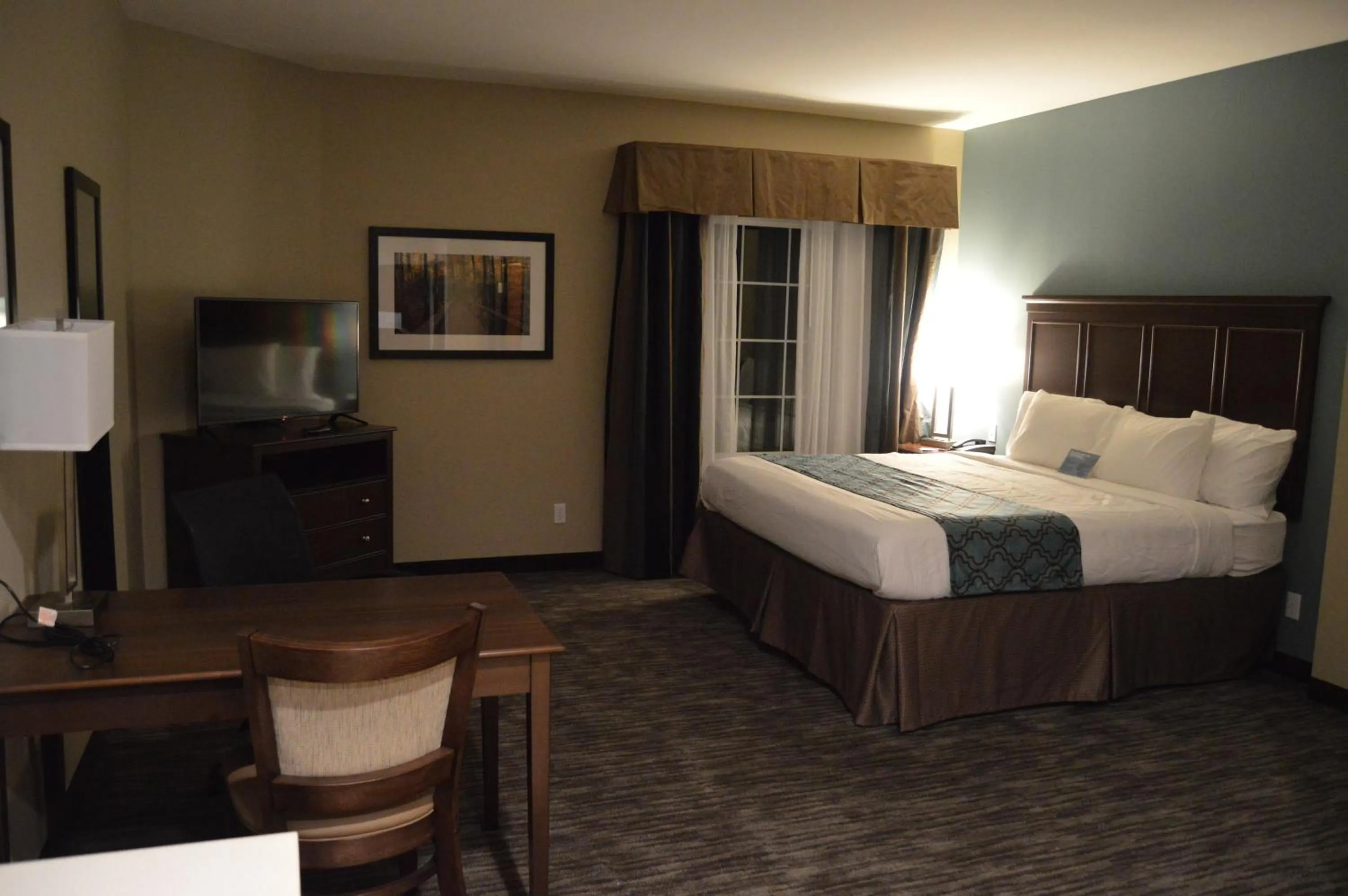 Photo of the whole room, Bed in Heritage Place Hotel and Suites